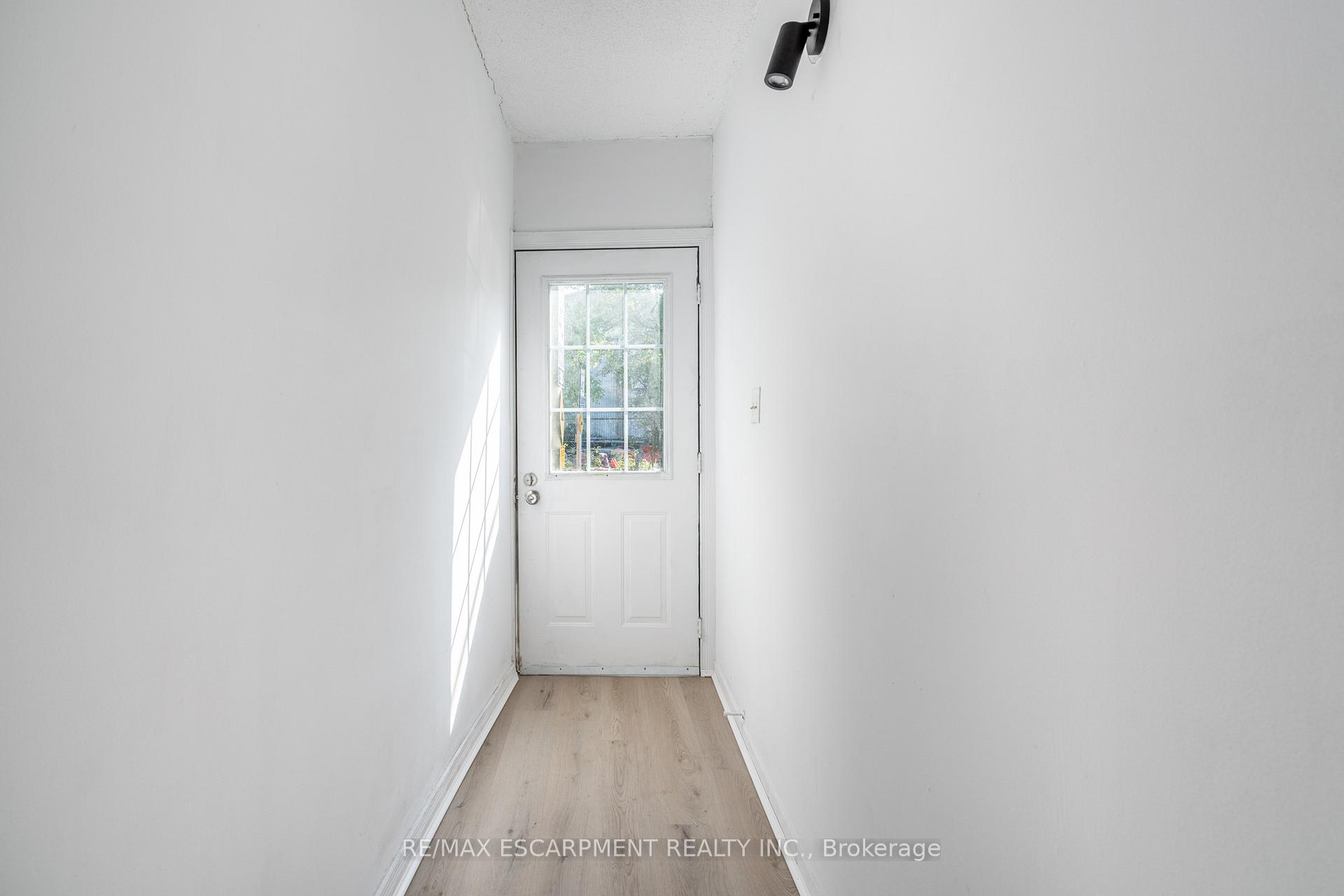 Photo 3 of 213 Caroline Street N, Hamilton, Central — HOMEH