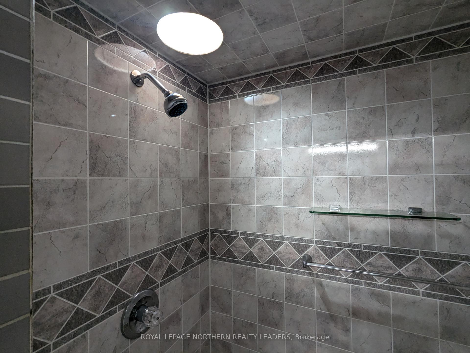 Photo 12 of 404 Eighth Avenue, Cochrane — HOMEH