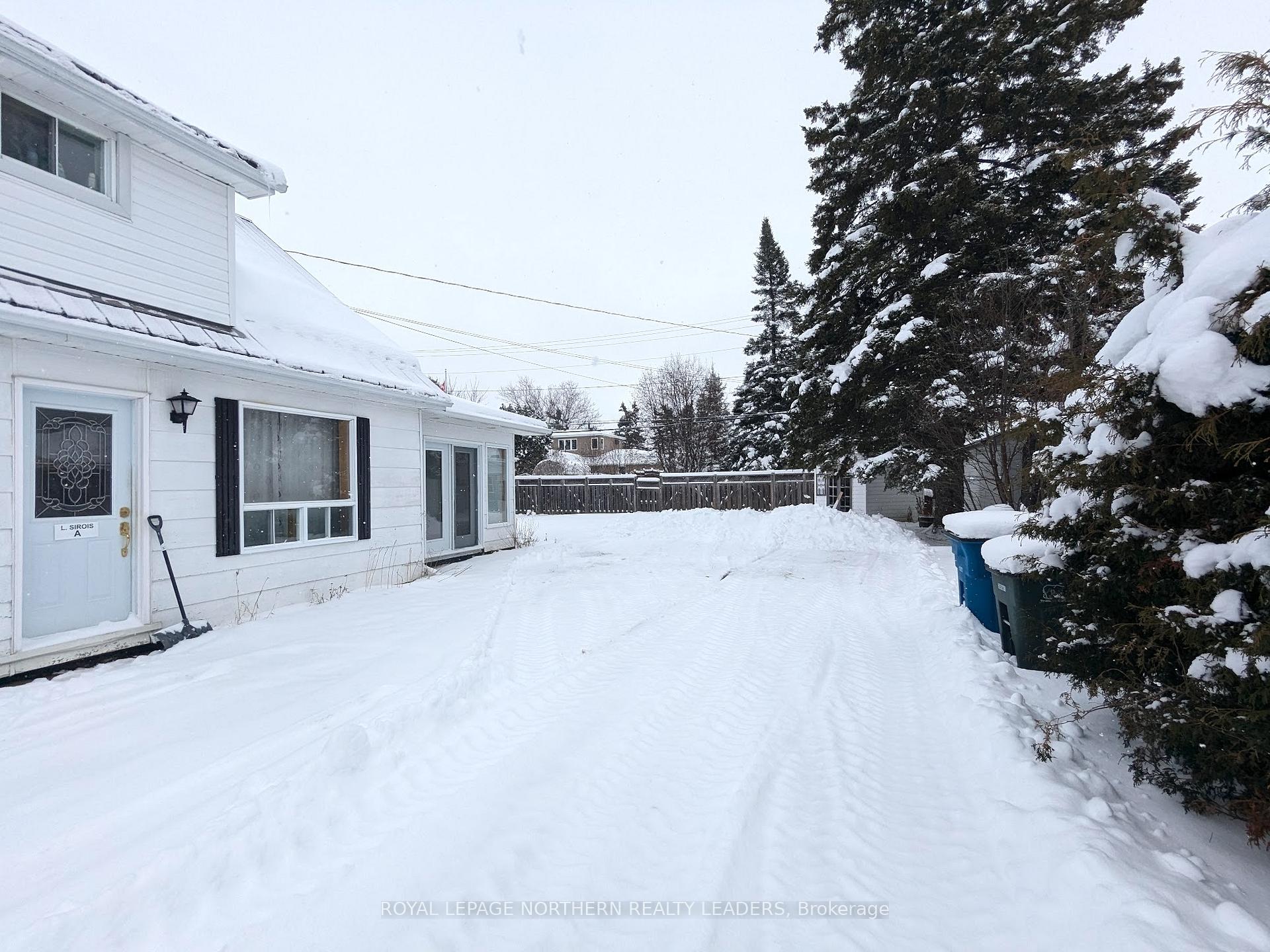 Photo 19 of 404 Eighth Avenue, Cochrane — HOMEH