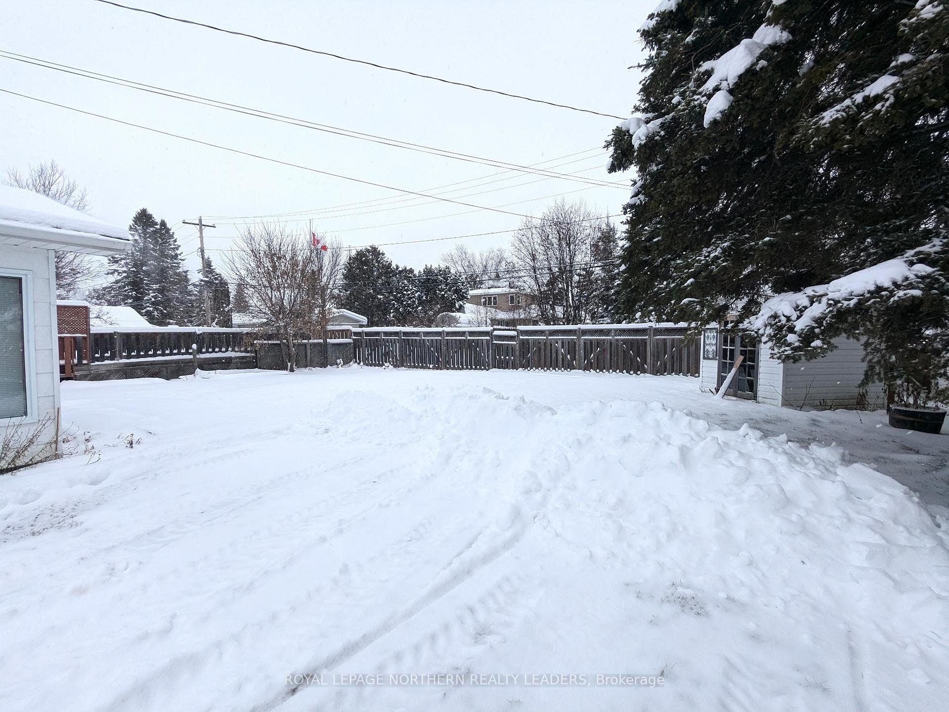 Photo 20 of 404 Eighth Avenue, Cochrane — HOMEH