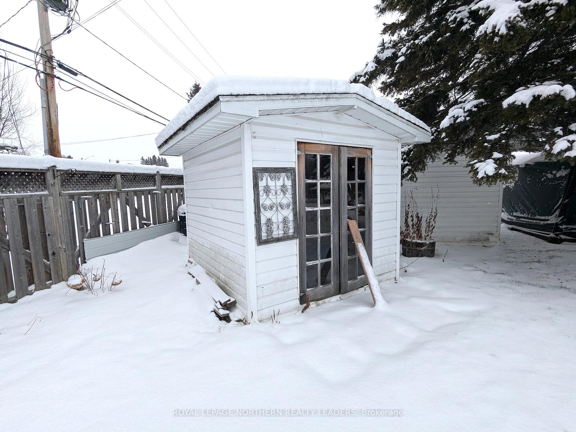 Photo 21 of 404 Eighth Avenue, Cochrane — HOMEH