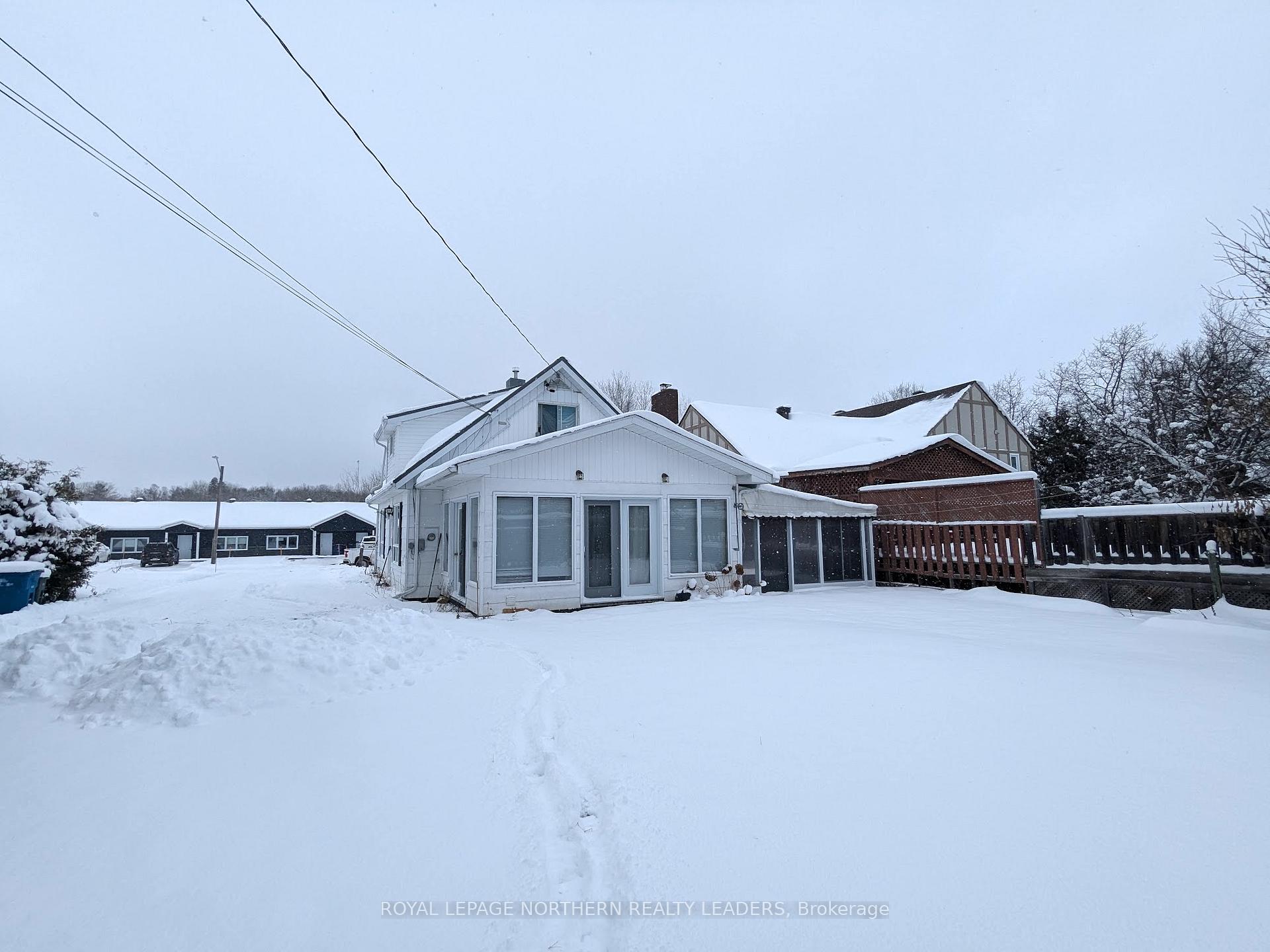 Photo 22 of 404 Eighth Avenue, Cochrane — HOMEH
