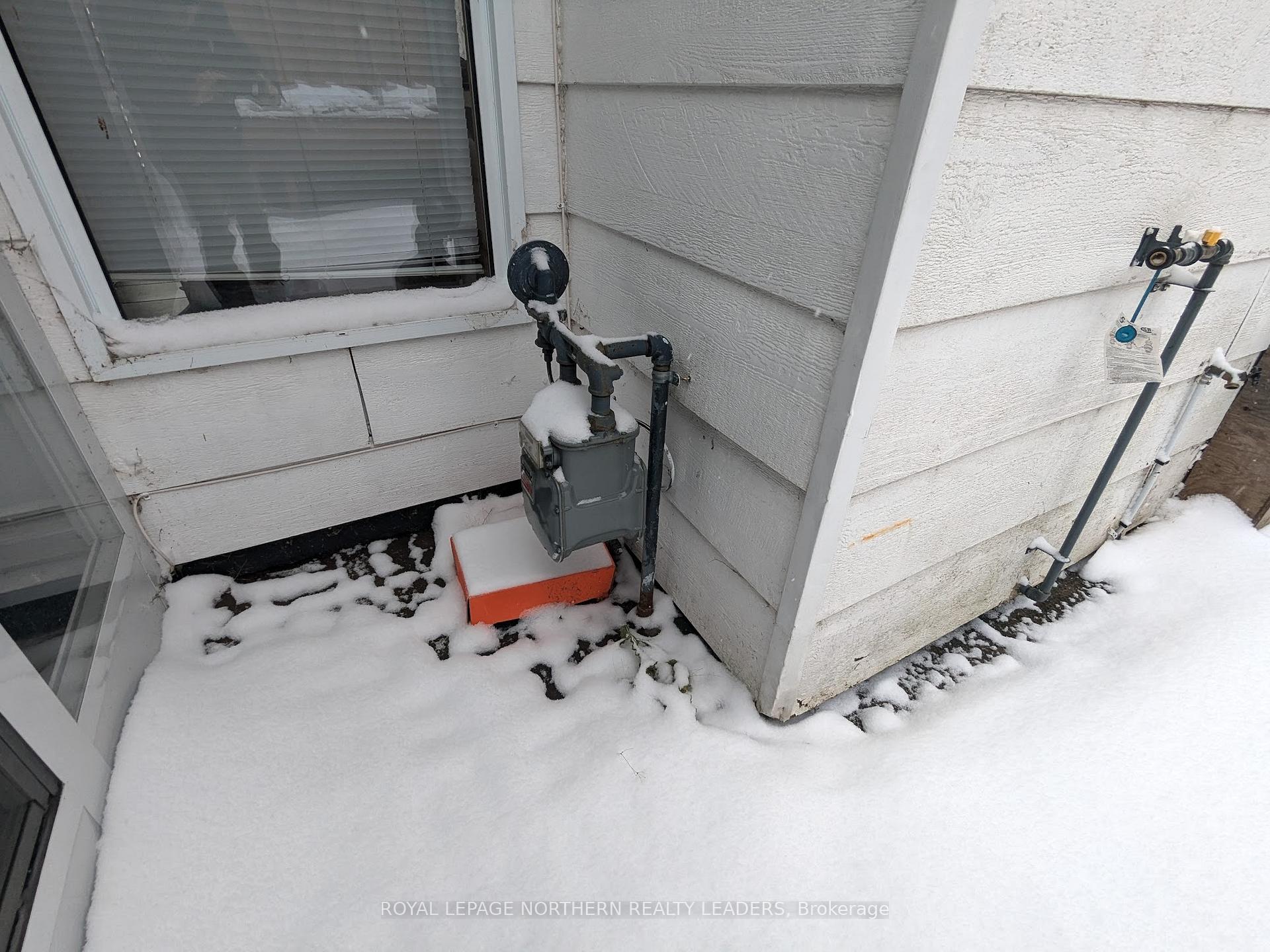 Photo 25 of 404 Eighth Avenue, Cochrane — HOMEH