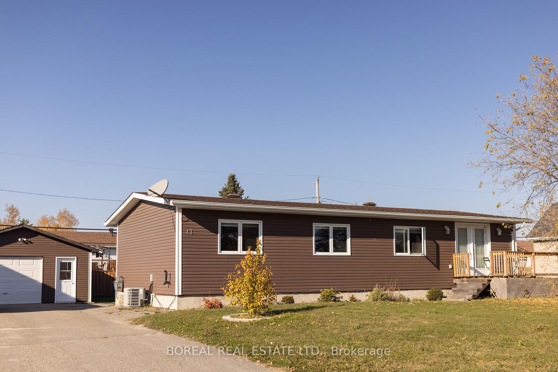 Photo 1 of 43 Huron Road, Cochrane — HOMEH