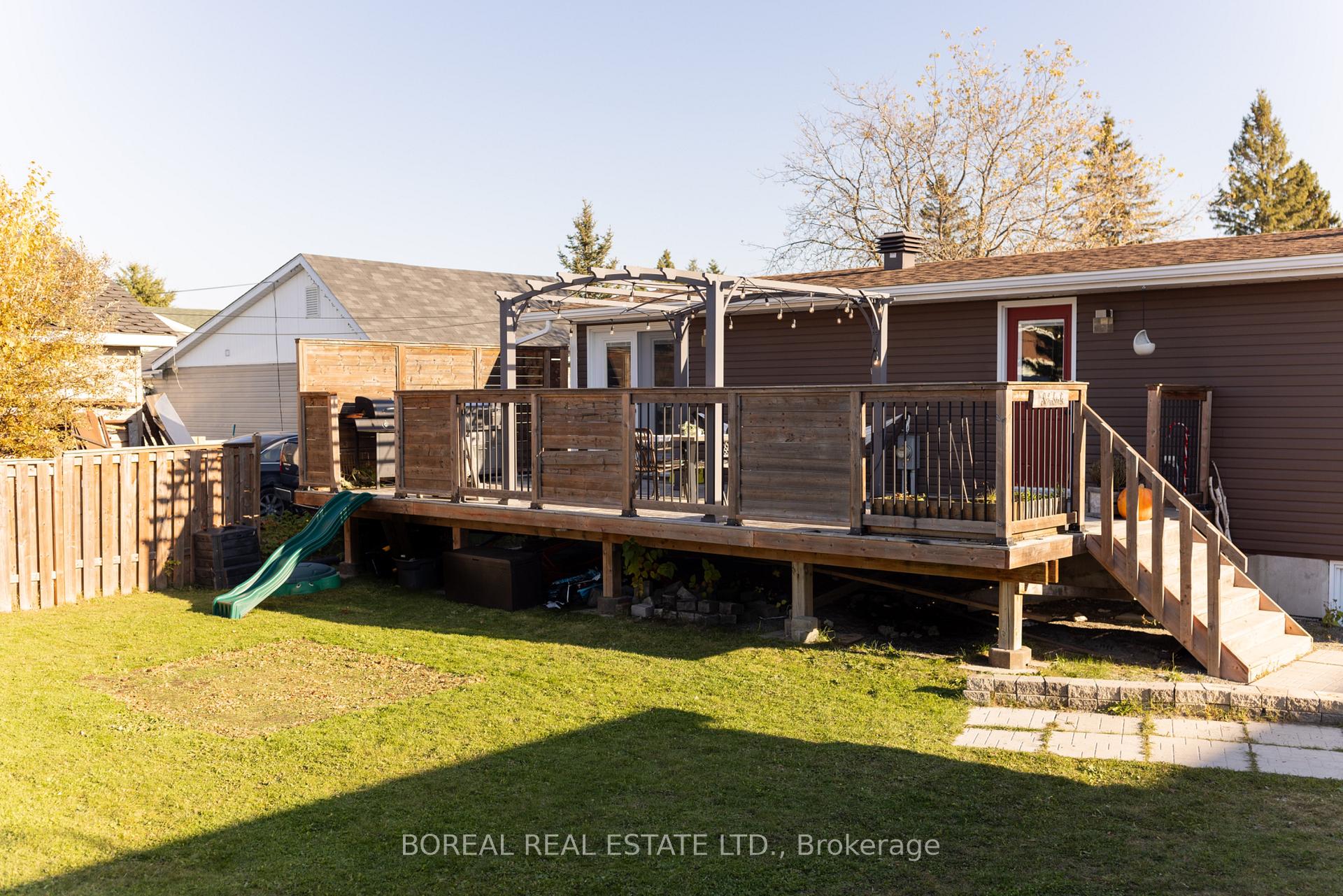 Photo 4 of 43 Huron Road, Cochrane — HOMEH
