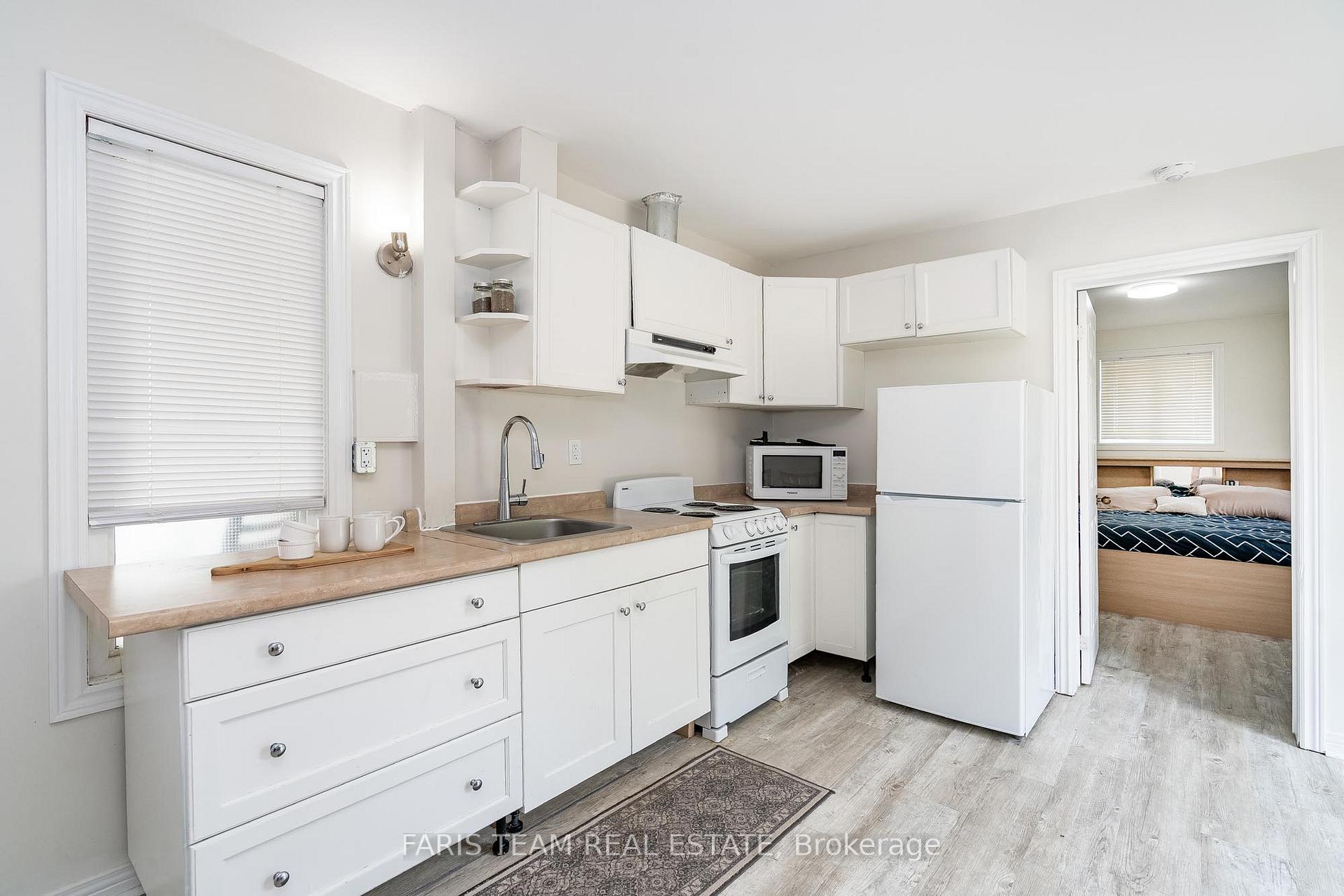 Photo 4 of 143 Burton Avenue, Barrie, Allandale — HOMEH