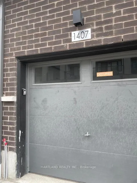 Front of Unit 1407, 1695 Dersan Street
