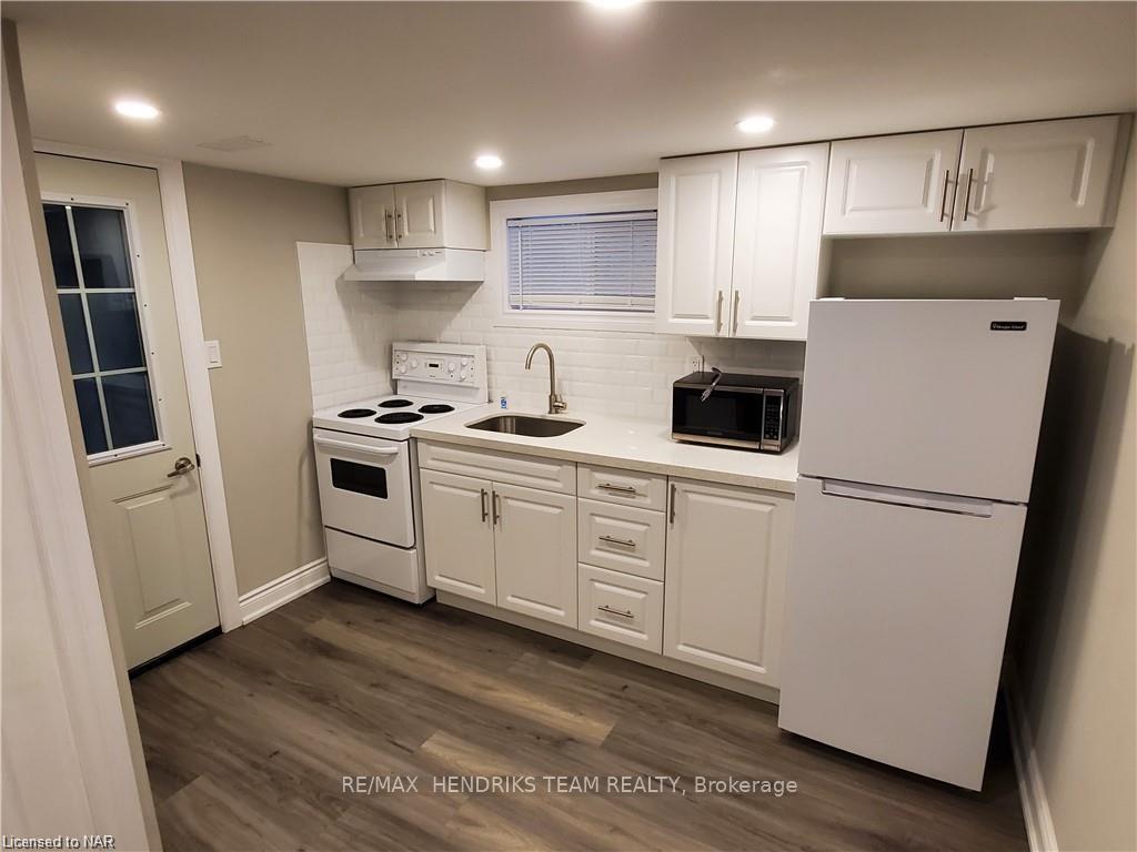 Photo 2 of Unit Lower, 4 Henry Street, St. Catharines, Downtown — HOMEH