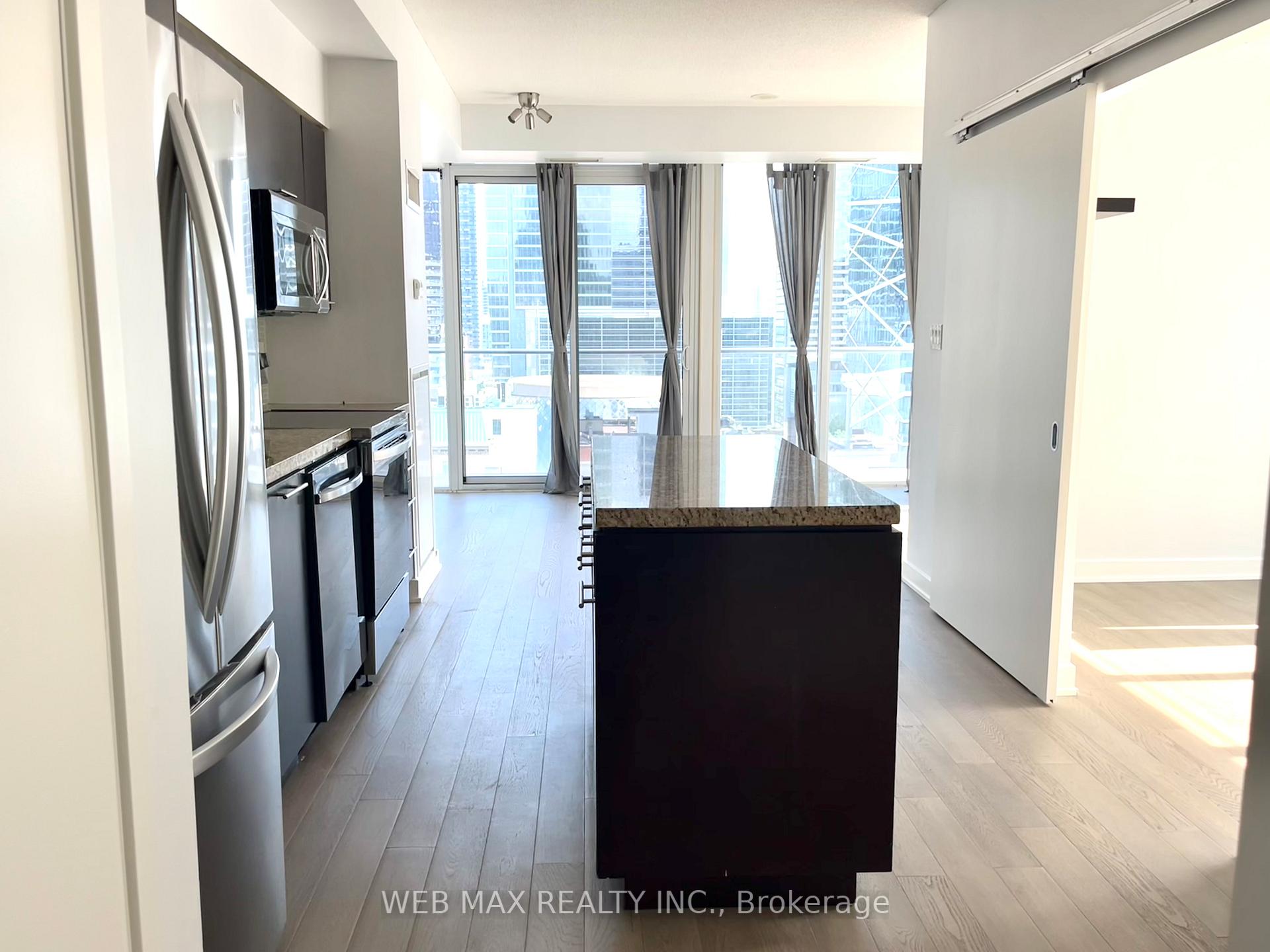 Photo 2 of Unit 1303, 126 Simcoe Street, Toronto, Waterfront Communities — HOMEH