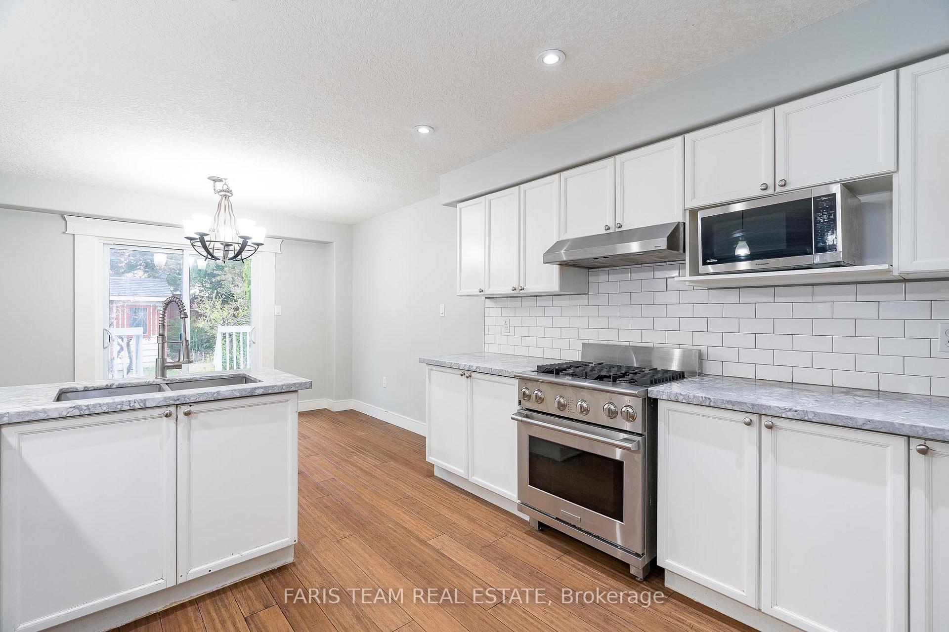 Photo 4 of 15 Dunsmore Lane, Barrie, Georgian Drive — HOMEH