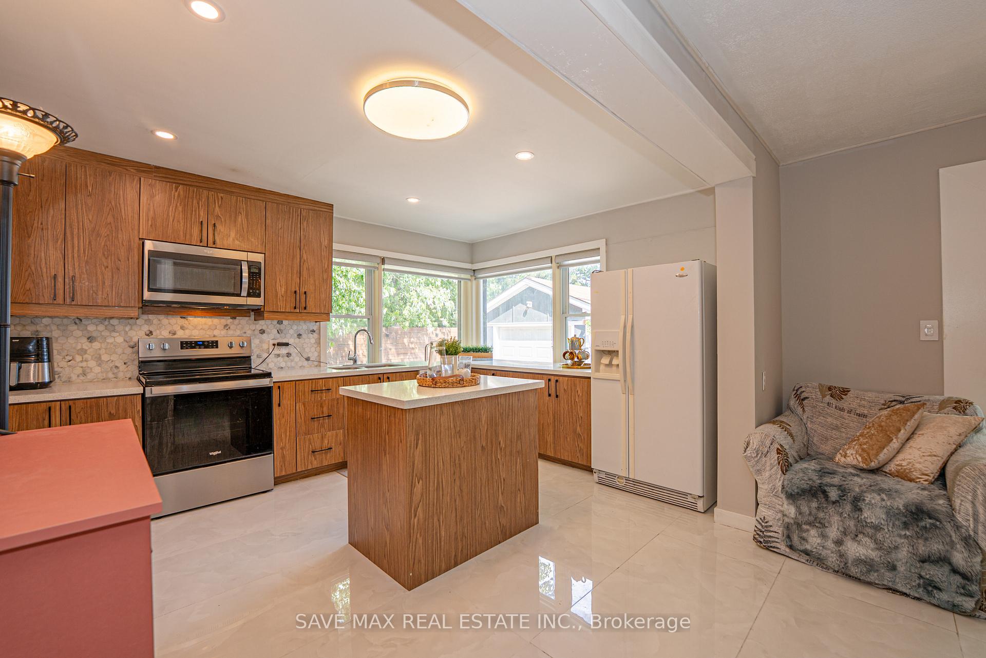 Photo 6 of 69 Eldomar Avenue, Brampton, Brampton East — HOMEH