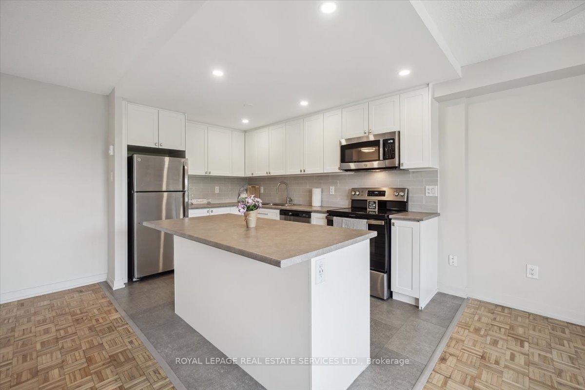 Photo 2 of Unit 408, 62 Park Avenue, Halton Hills, Georgetown — HOMEH