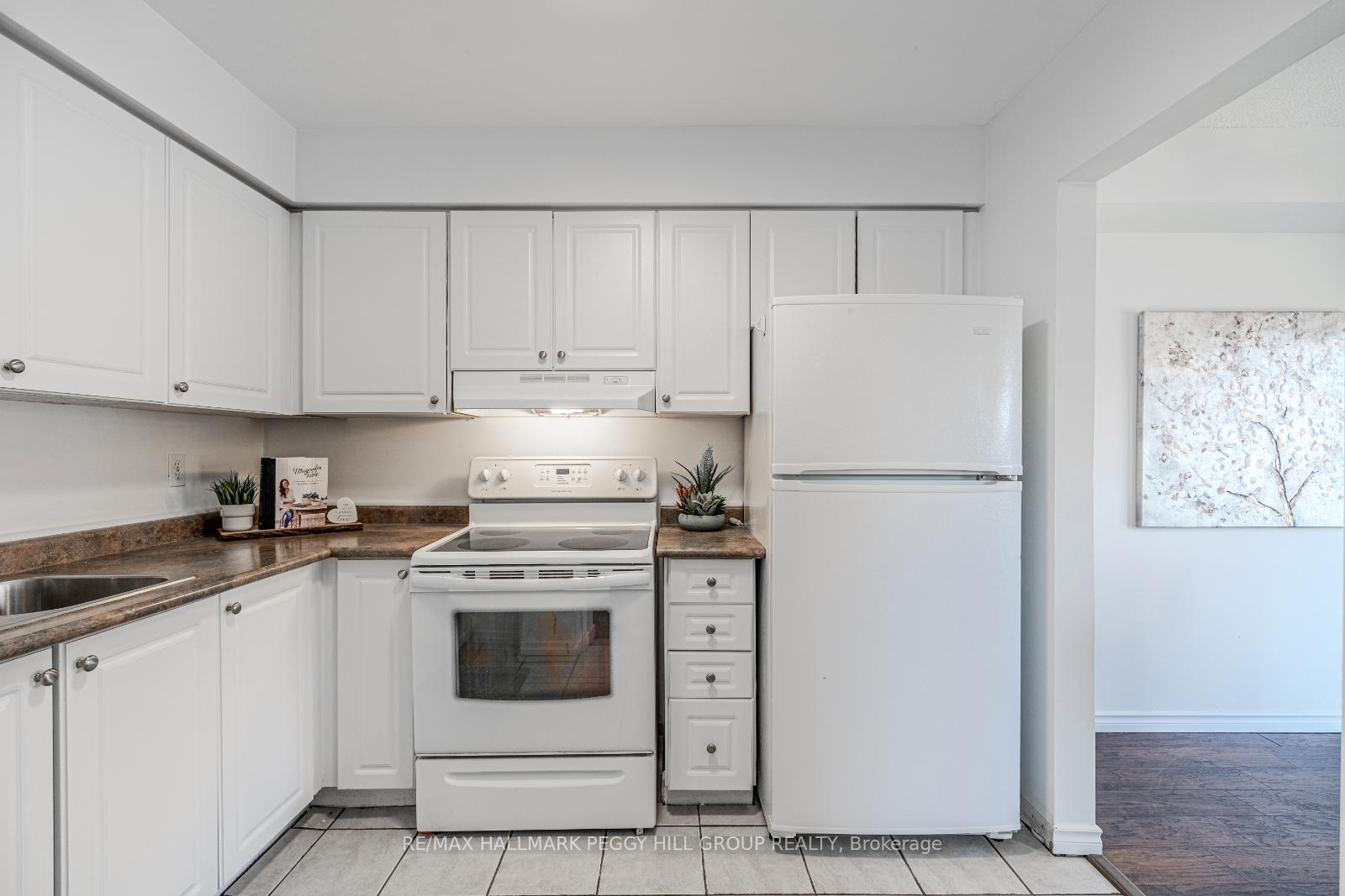 Photo 3 of Unit 1, 52 Adelaide Street, Barrie, Allandale — HOMEH