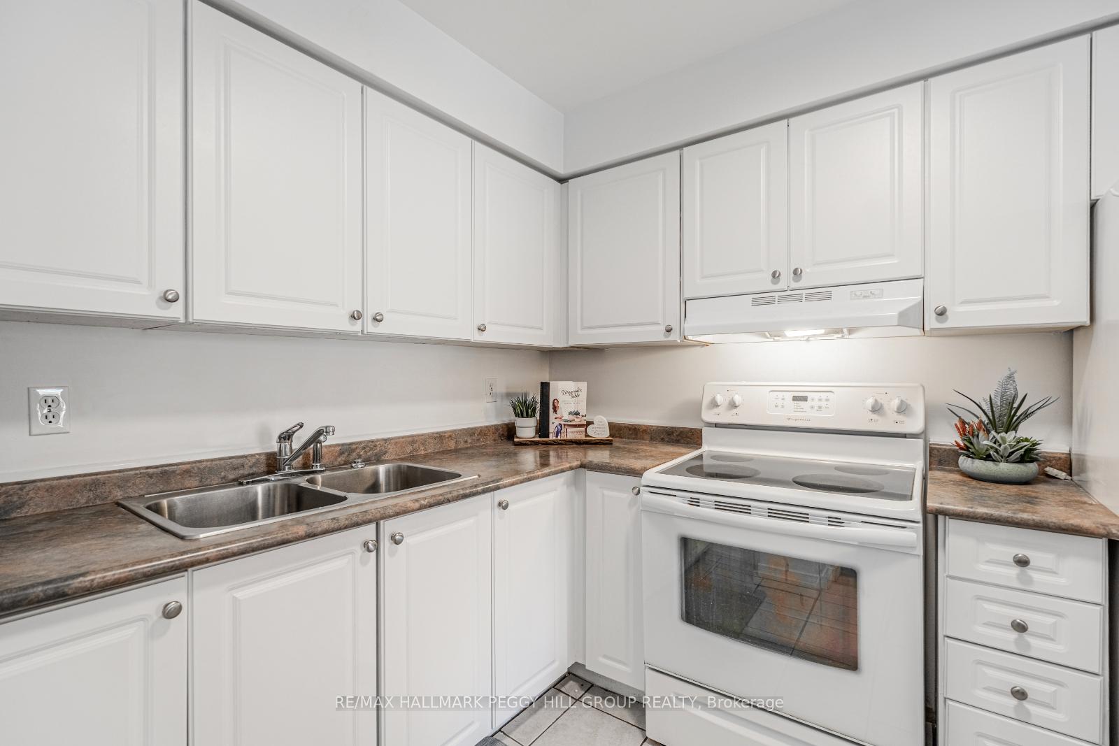 Photo 4 of Unit 1, 52 Adelaide Street, Barrie, Allandale — HOMEH