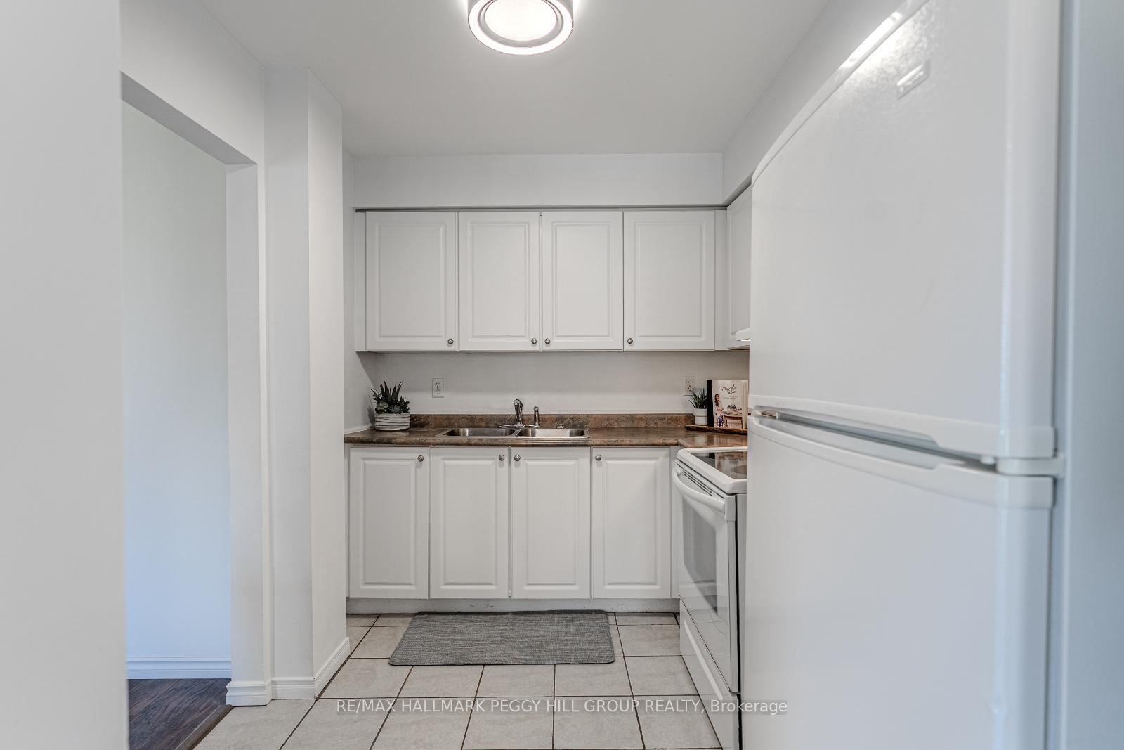 Photo 5 of Unit 1, 52 Adelaide Street, Barrie, Allandale — HOMEH