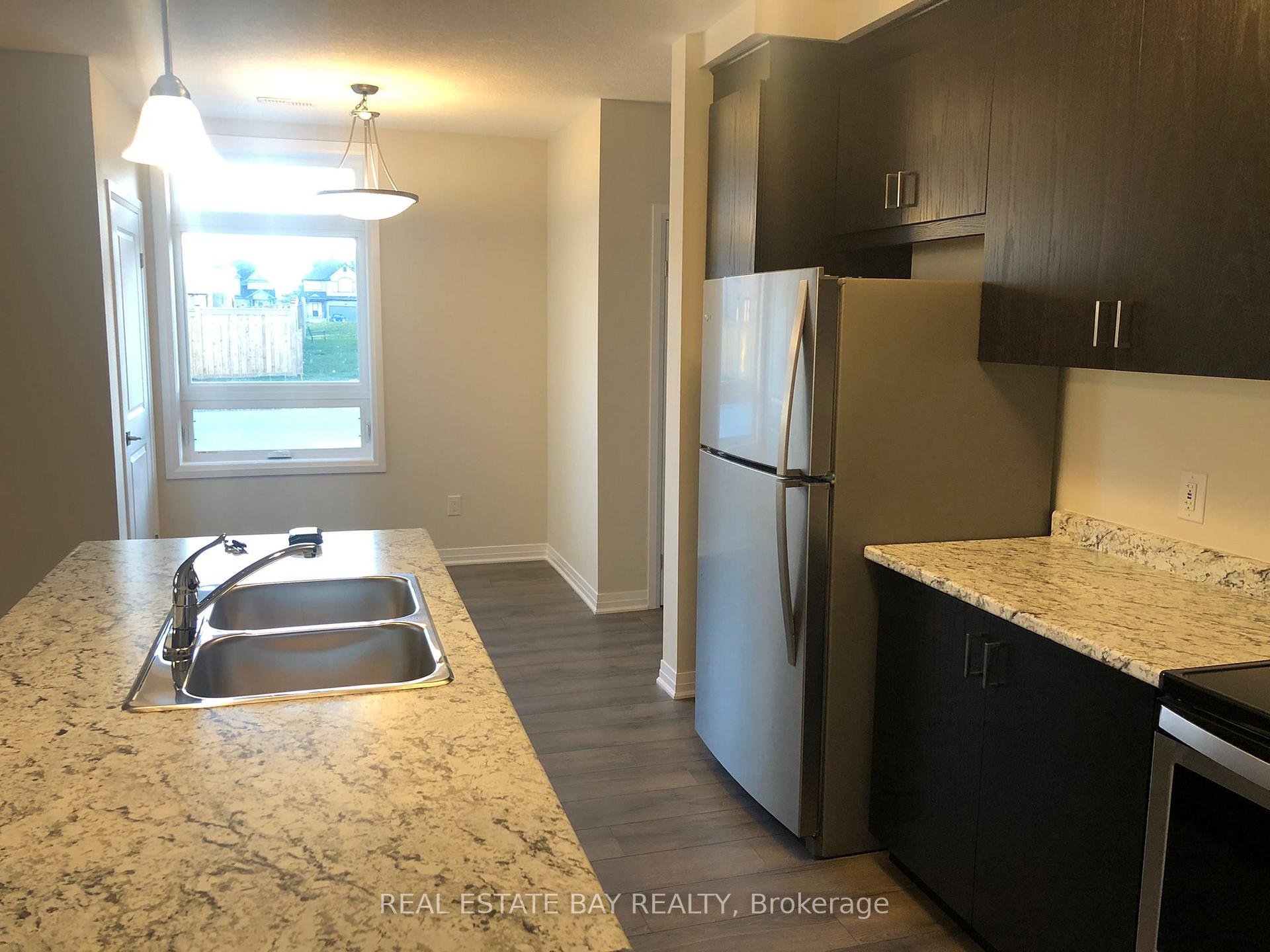 Photo 26 of Unit 1A, 155 Thomas Slee Drive, Kitchener, Doon South — HOMEH