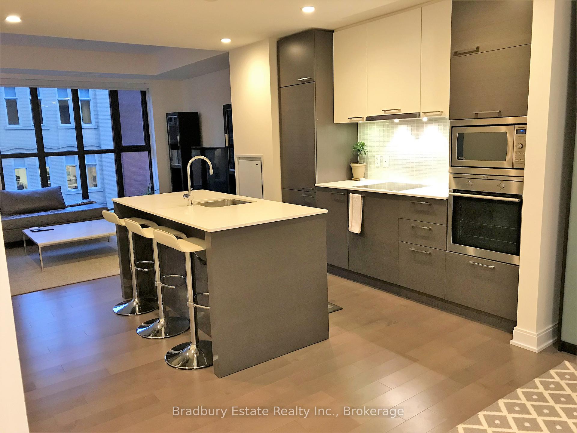 Photo 4 of Unit 404, 55 Front Street E, Toronto, Waterfront Communities — HOMEH