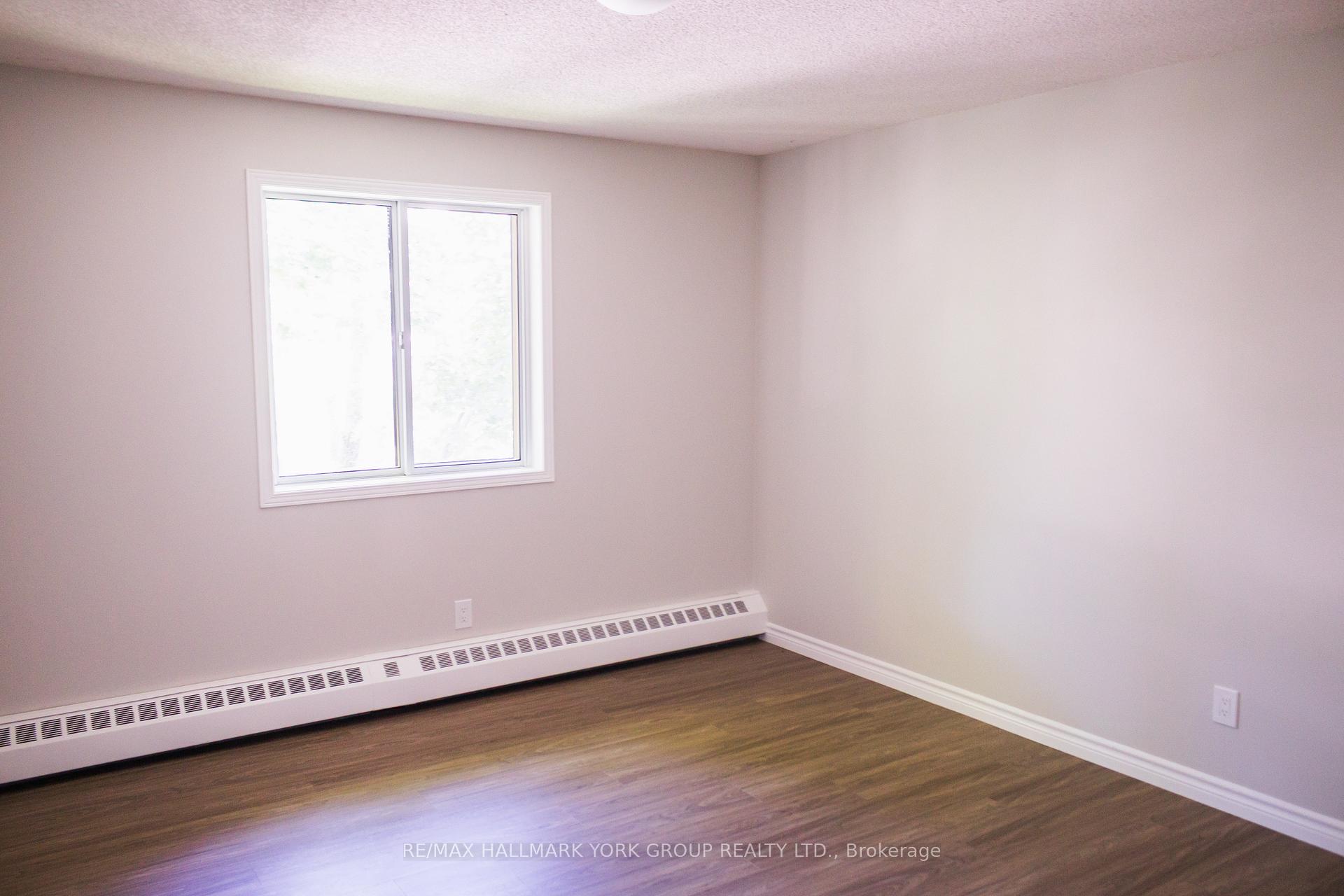 Photo 10 of Unit 406, 260 Leacock Drive, Barrie, Letitia Heights — HOMEH