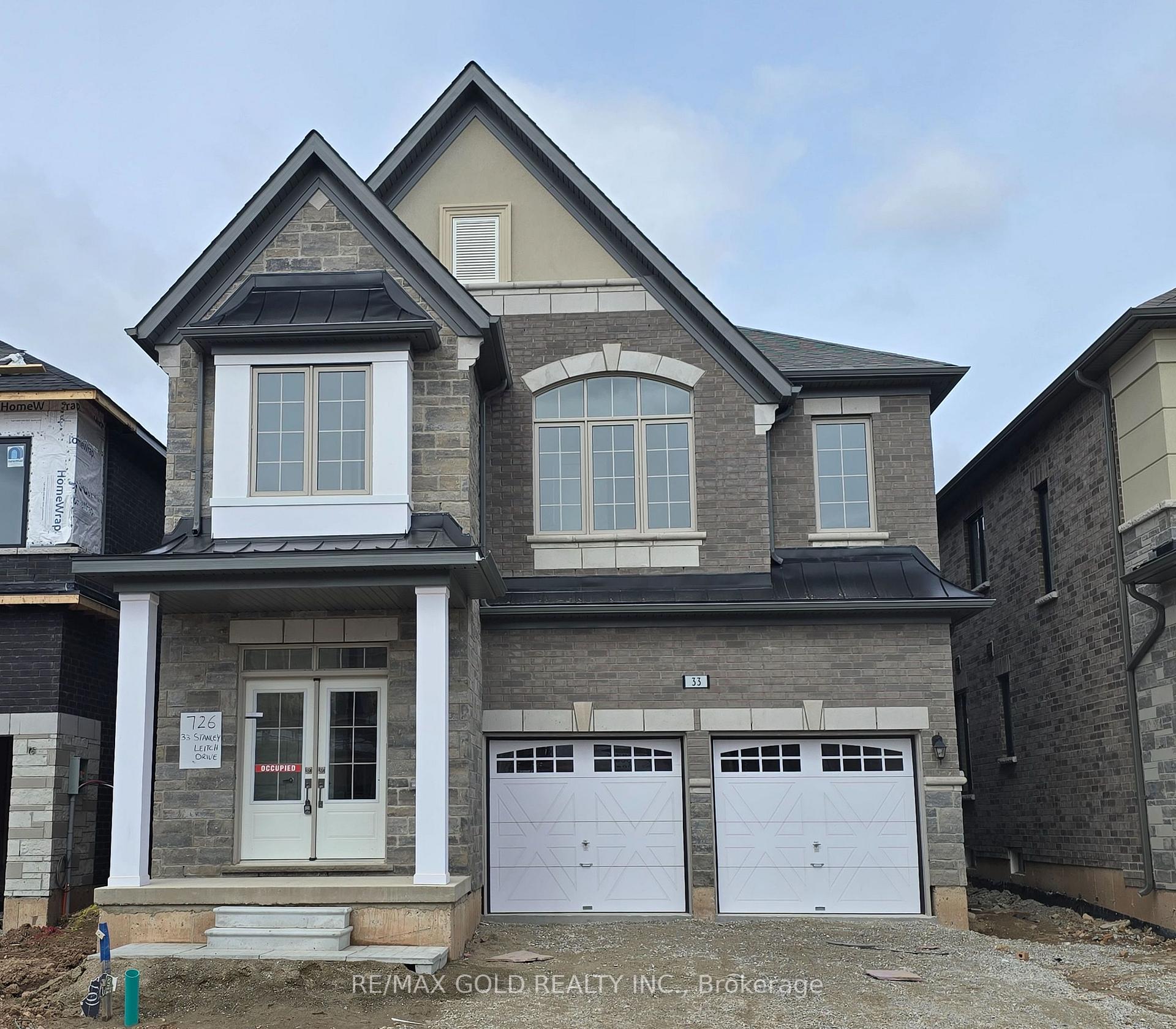 Photo 1 of 33 Stanley Leitch Drive, Kitchener, Mill Courtland Woodside Park — HOMEH