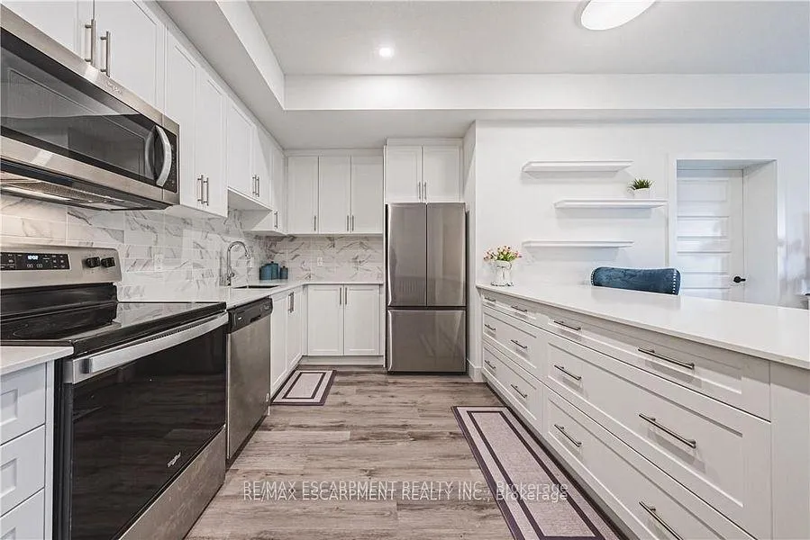 Photo 3 of Unit 310, 1201 Lackner Place, Kitchener — HOMEH