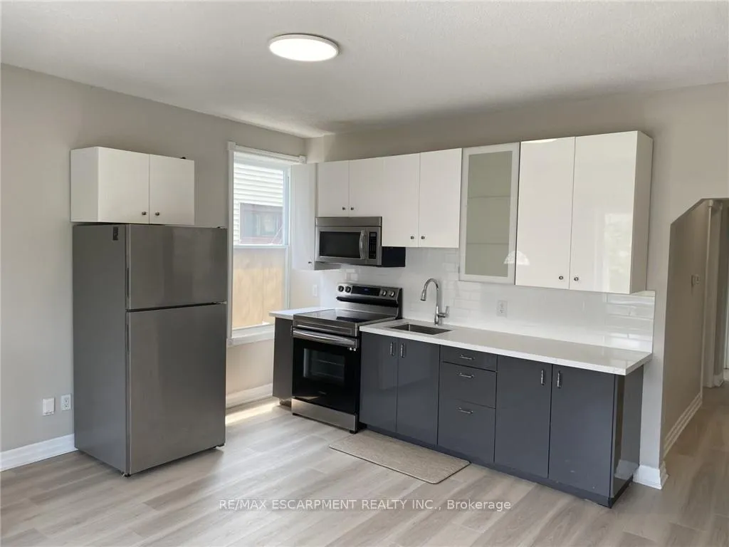 Photo 7 of Unit MAIN, 1164 Cannon Street E, Hamilton, Crown Point — HOMEH