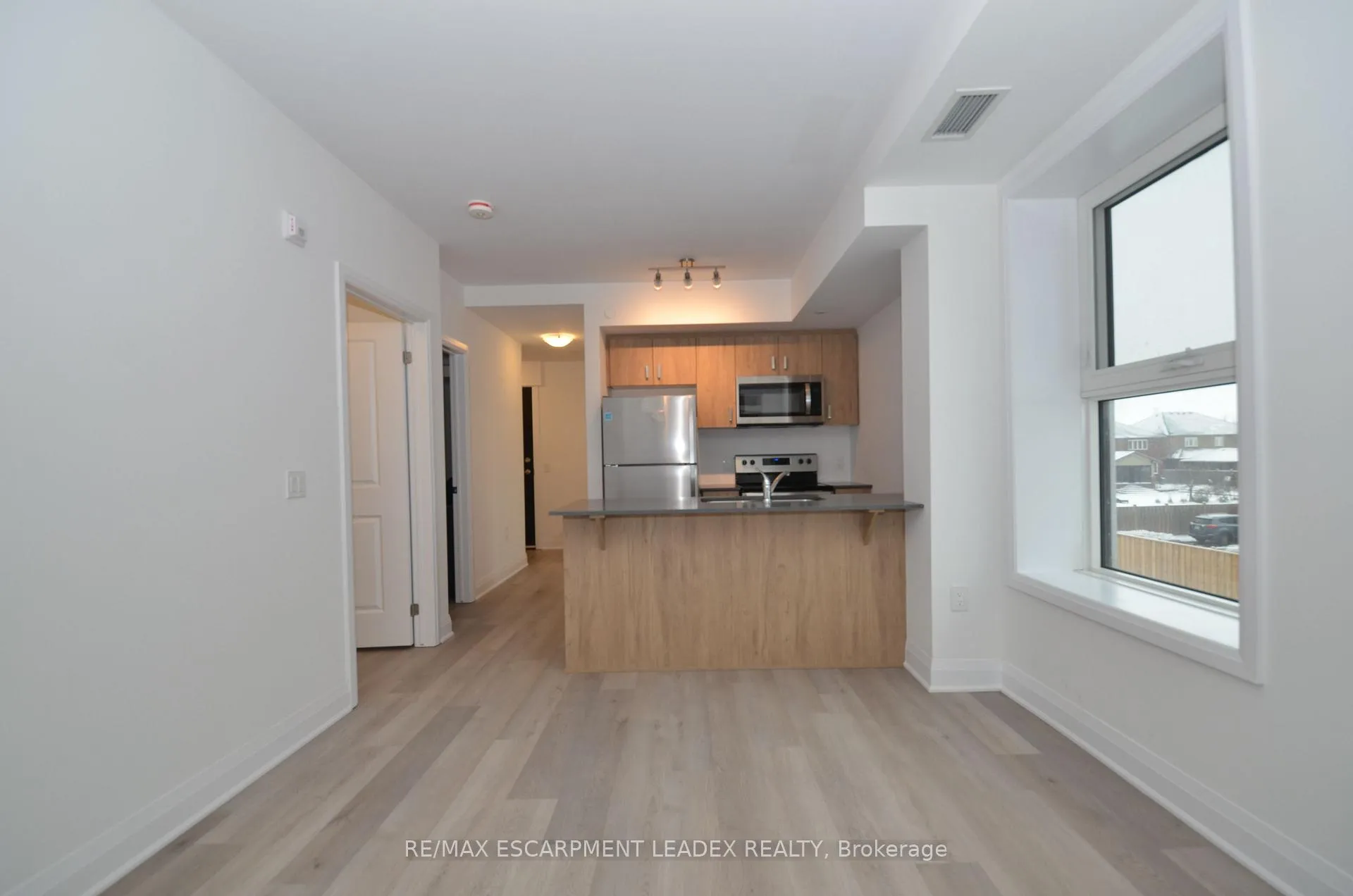 Photo 3 of Unit 205, 1936 Rymal Road E, Hamilton, Stoney Creek Mountain — HOMEH