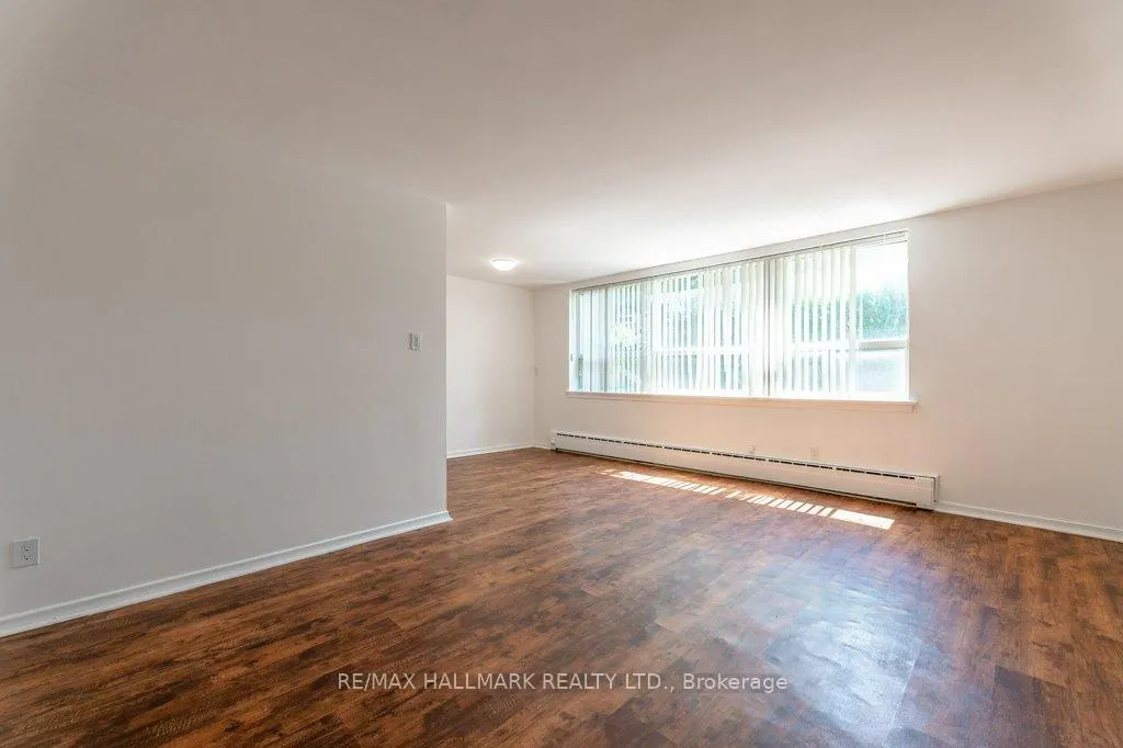 Photo 3 of Unit 2, 53 Neptune Drive, Toronto, Englemount-Lawrence — HOMEH