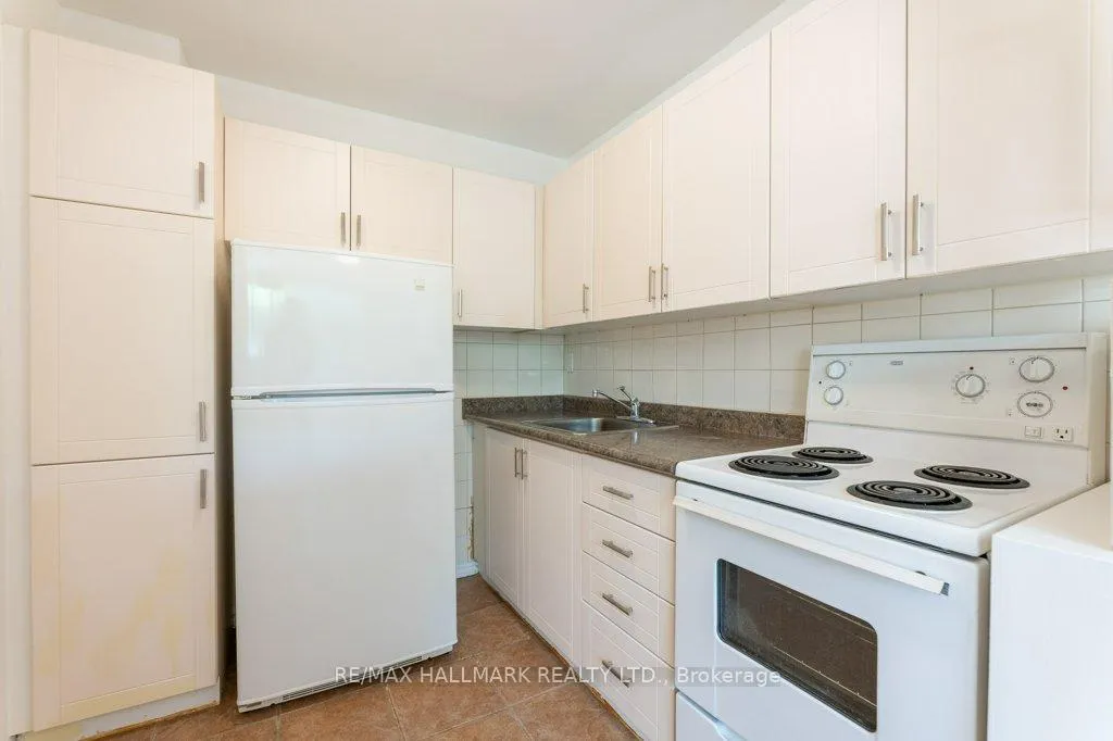 Photo 8 of Unit 2, 53 Neptune Drive, Toronto, Englemount-Lawrence — HOMEH