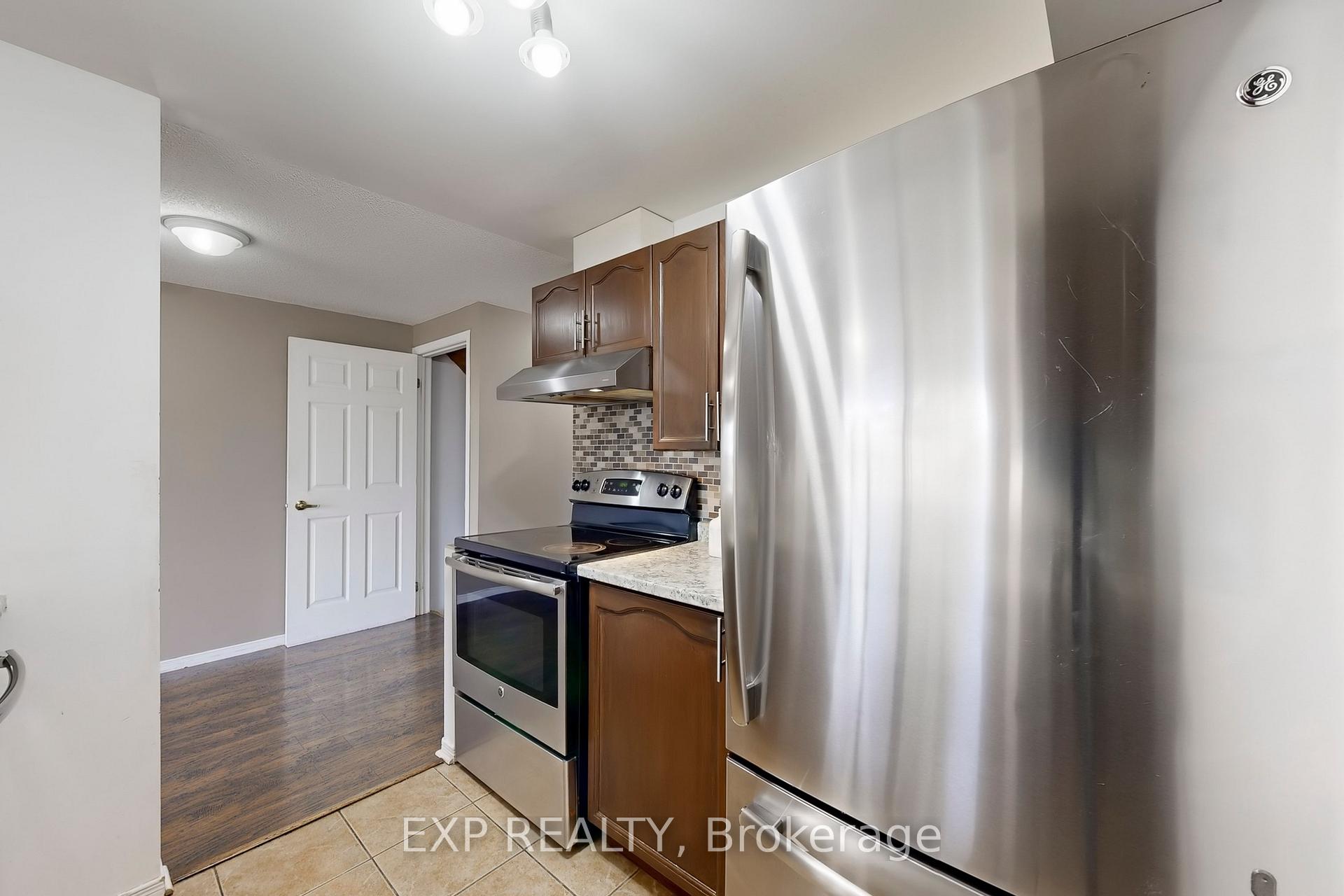 Photo 8 of 69 Goodwin Drive, Barrie, Painswick South — HOMEH