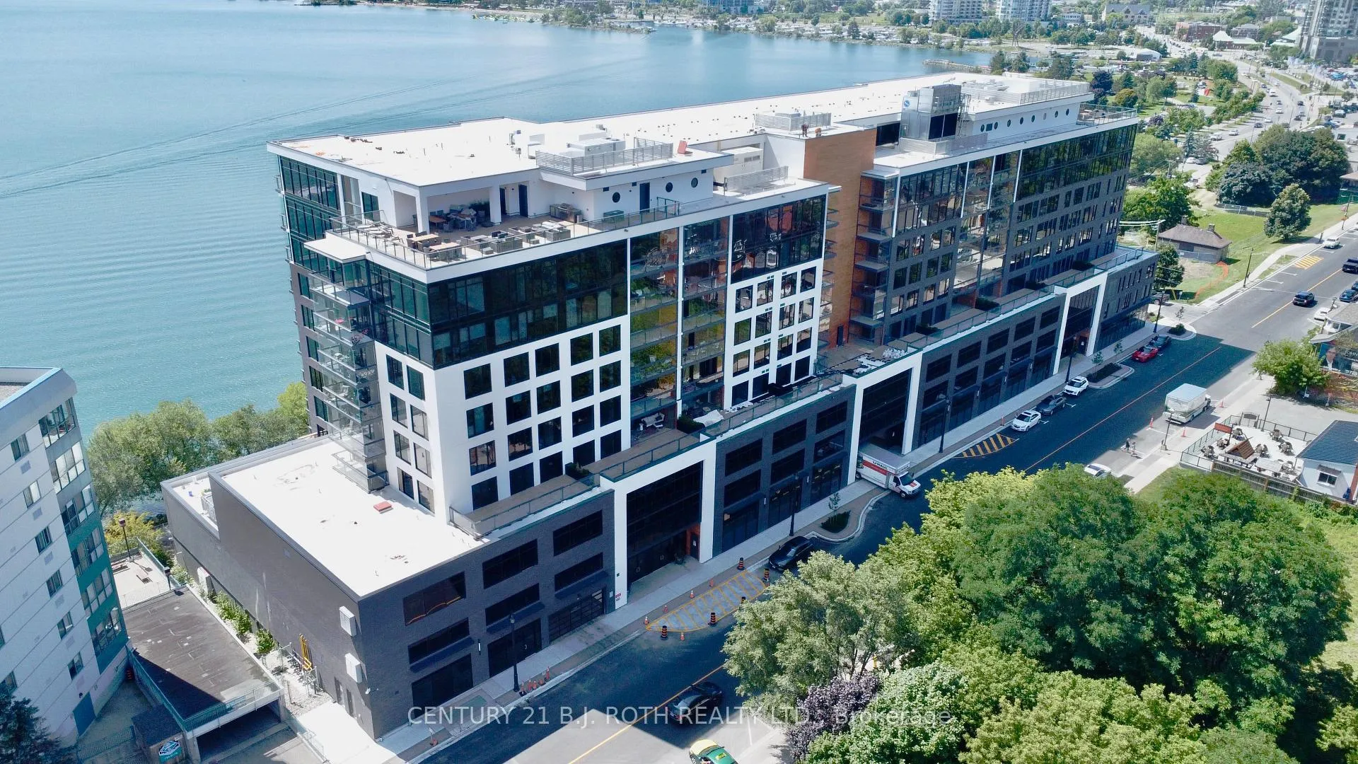Photo 1 of Unit 409, 185 Dunlop Street E, Barrie, Lakeshore — HOMEH