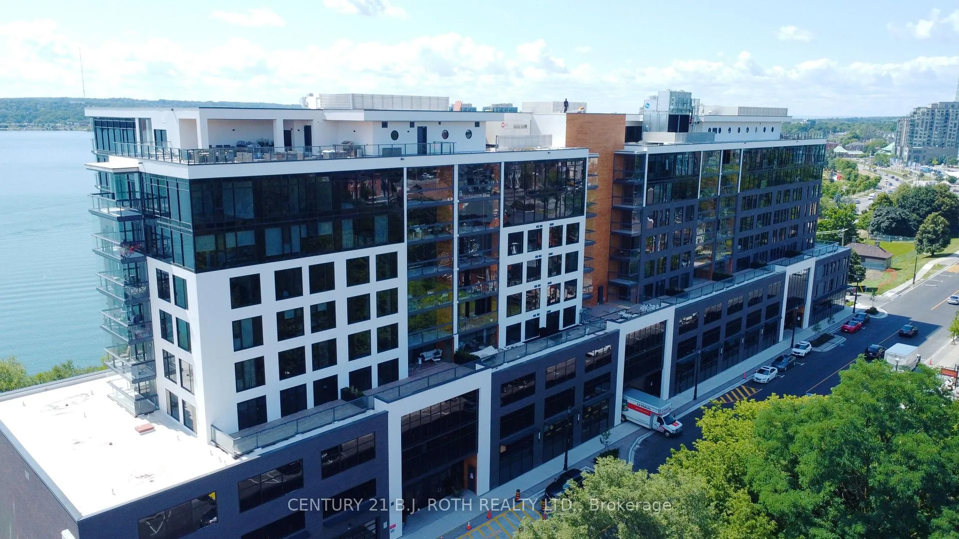 Photo 3 of Unit 409, 185 Dunlop Street E, Barrie, Lakeshore — HOMEH