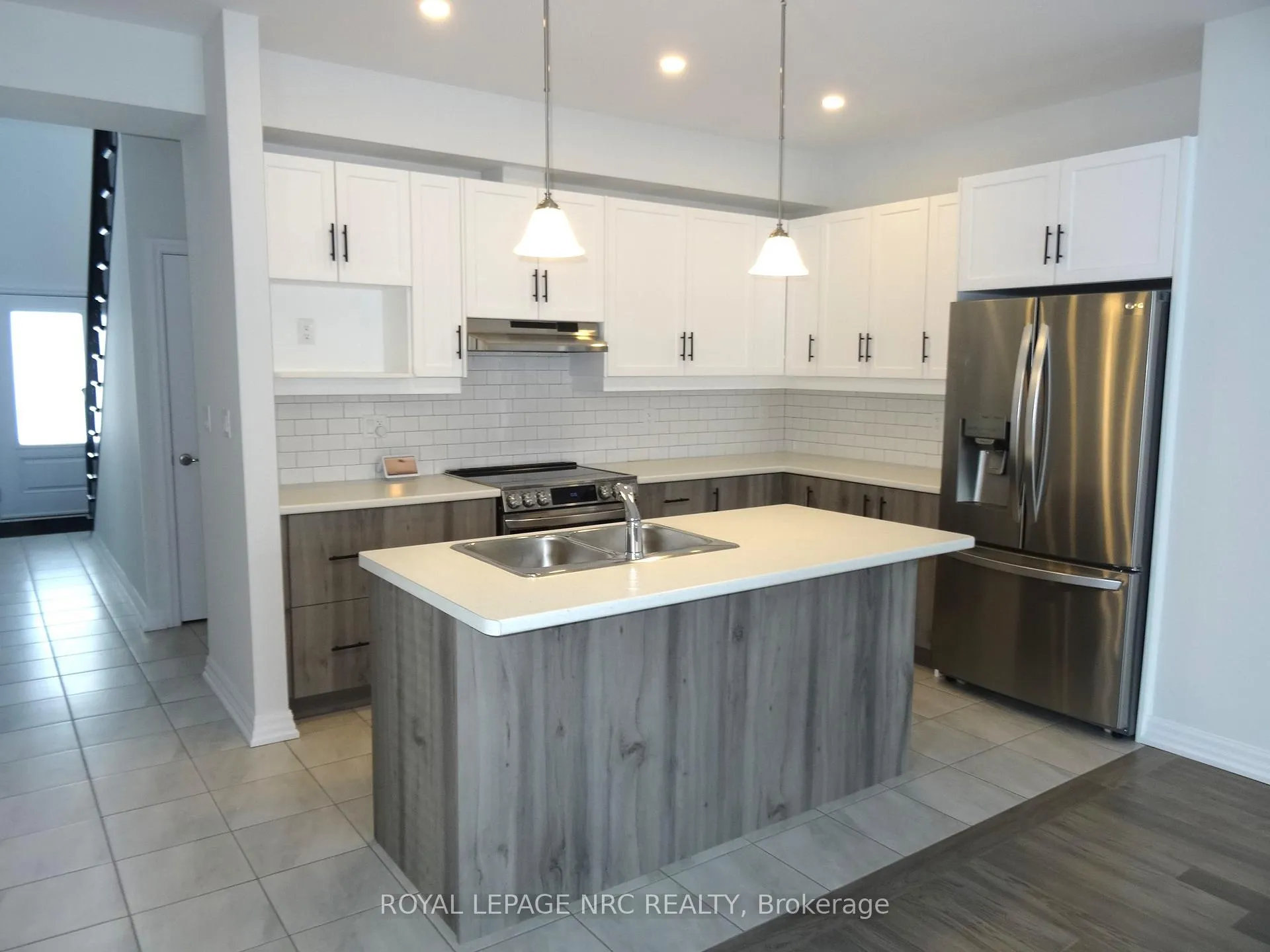 Photo 3 of Unit 1, 4311 Mann Street, Niagara Falls, Lyons Creek — HOMEH
