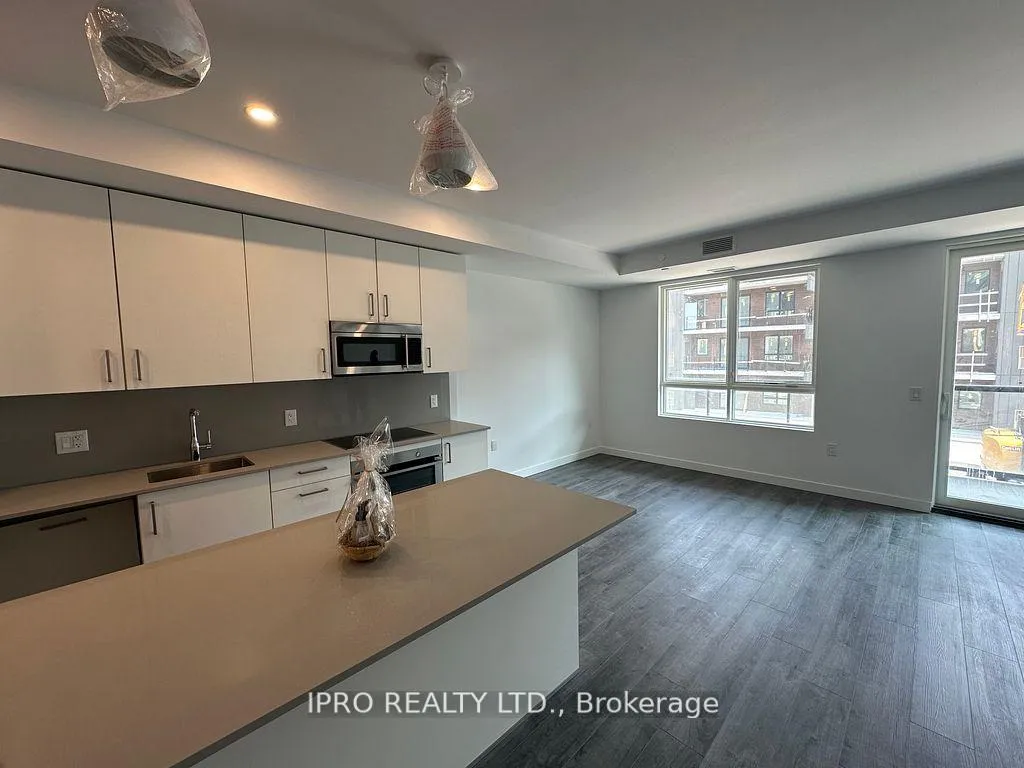 Photo 2 of Unit 217, 7549 Kaler Road, Niagara Falls, Brown — HOMEH