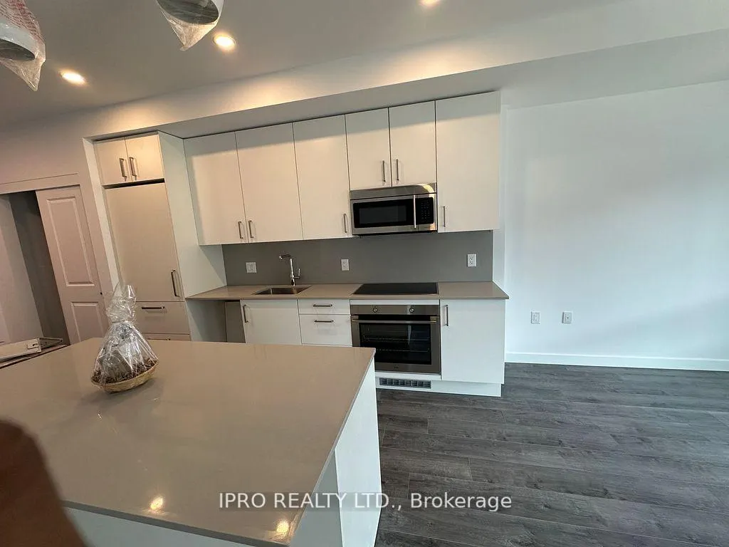 Photo 3 of Unit 217, 7549 Kaler Road, Niagara Falls, Brown — HOMEH