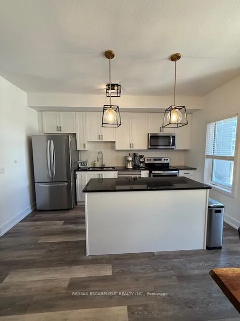 Photo 5 of Unit 2, 115 Shoreview Place, Hamilton, Lakeshore — HOMEH