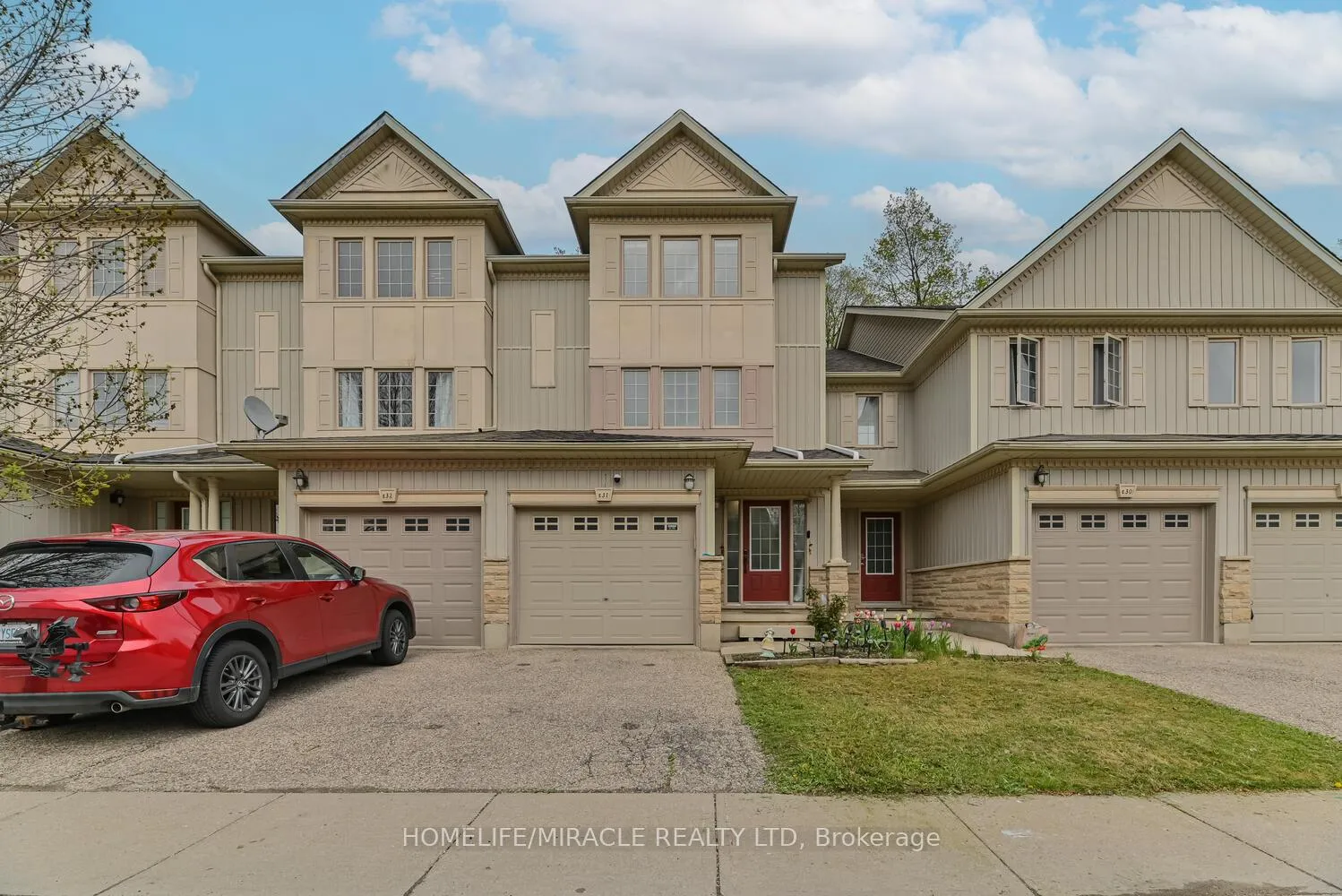 Photo 1 of Unit E-31, 110 Activa Avenue, Kitchener, Larentian West — HOMEH