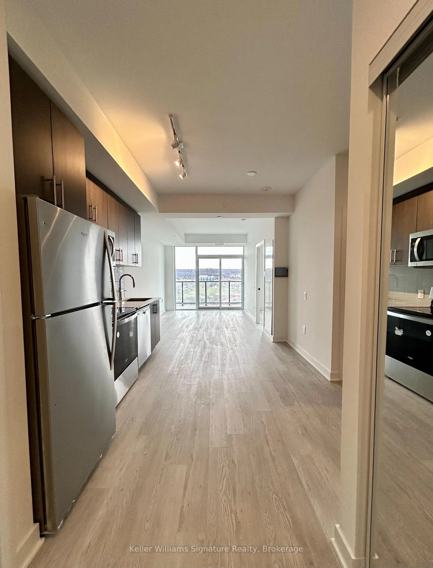 Photo 2 of Unit 1103, 2782 Barton Street E, Hamilton, Grayside — HOMEH