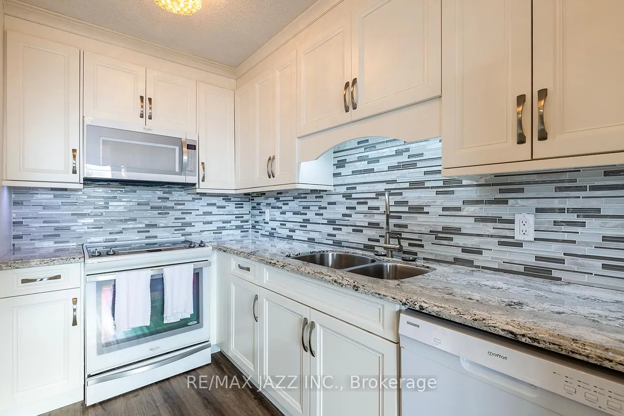 Photo 11 of Unit 623, 50 Richmond Street E, Oshawa, McLaughlin — HOMEH