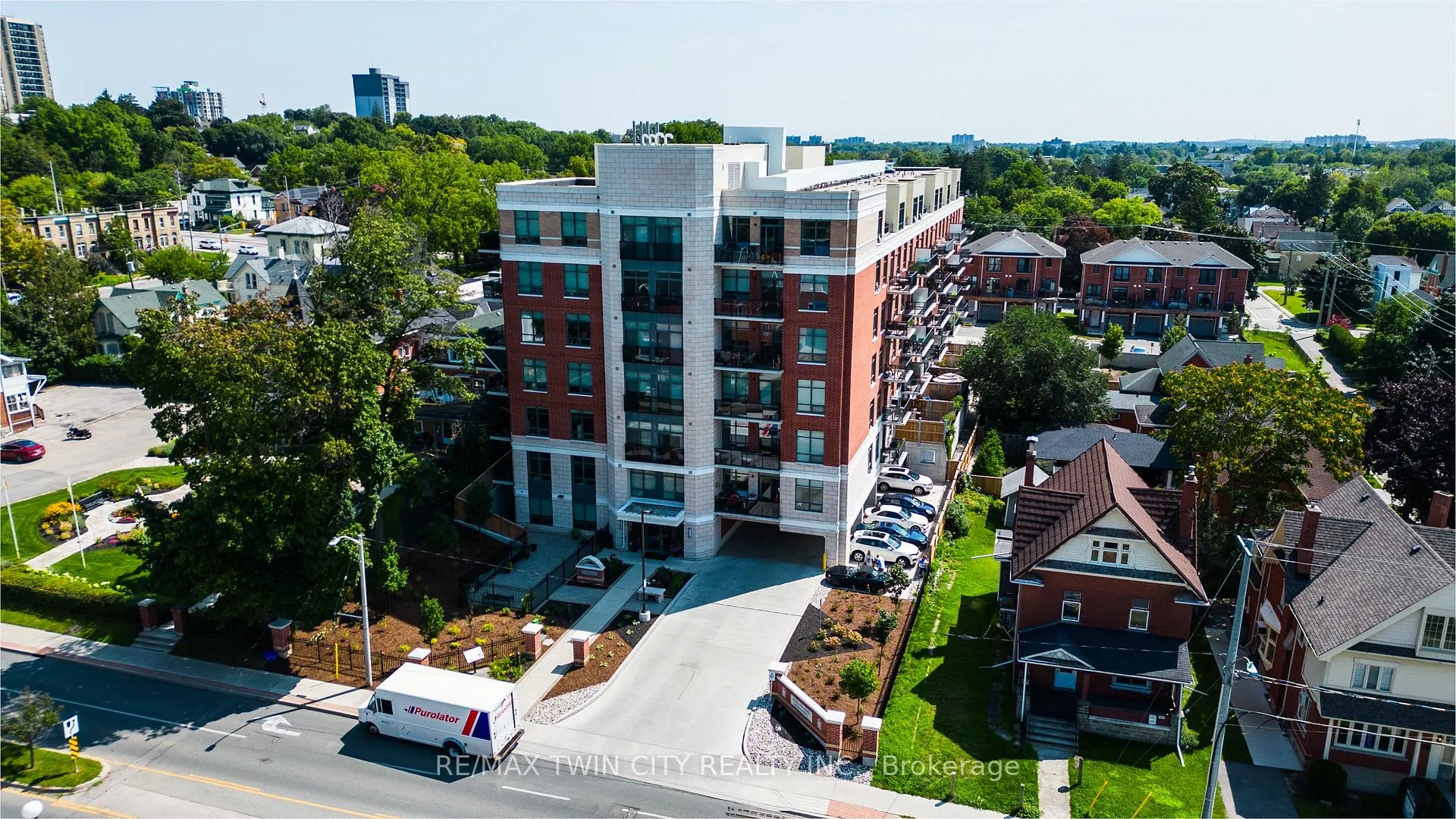 Photo 1 of Unit 201, 399 Queen Street S, Kitchener — HOMEH