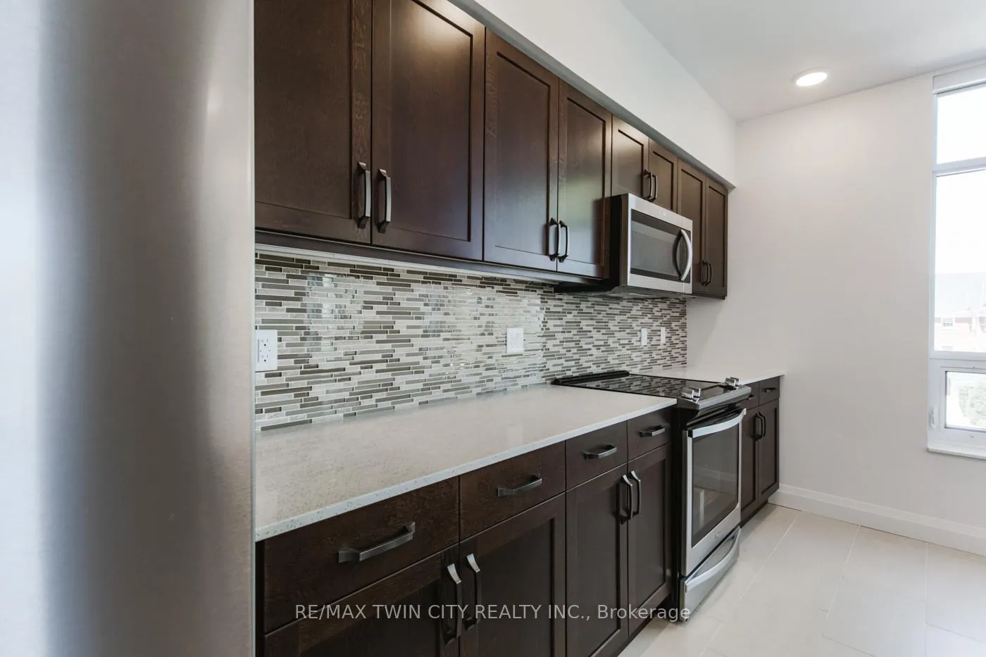 Photo 11 of Unit 201, 399 Queen Street S, Kitchener — HOMEH