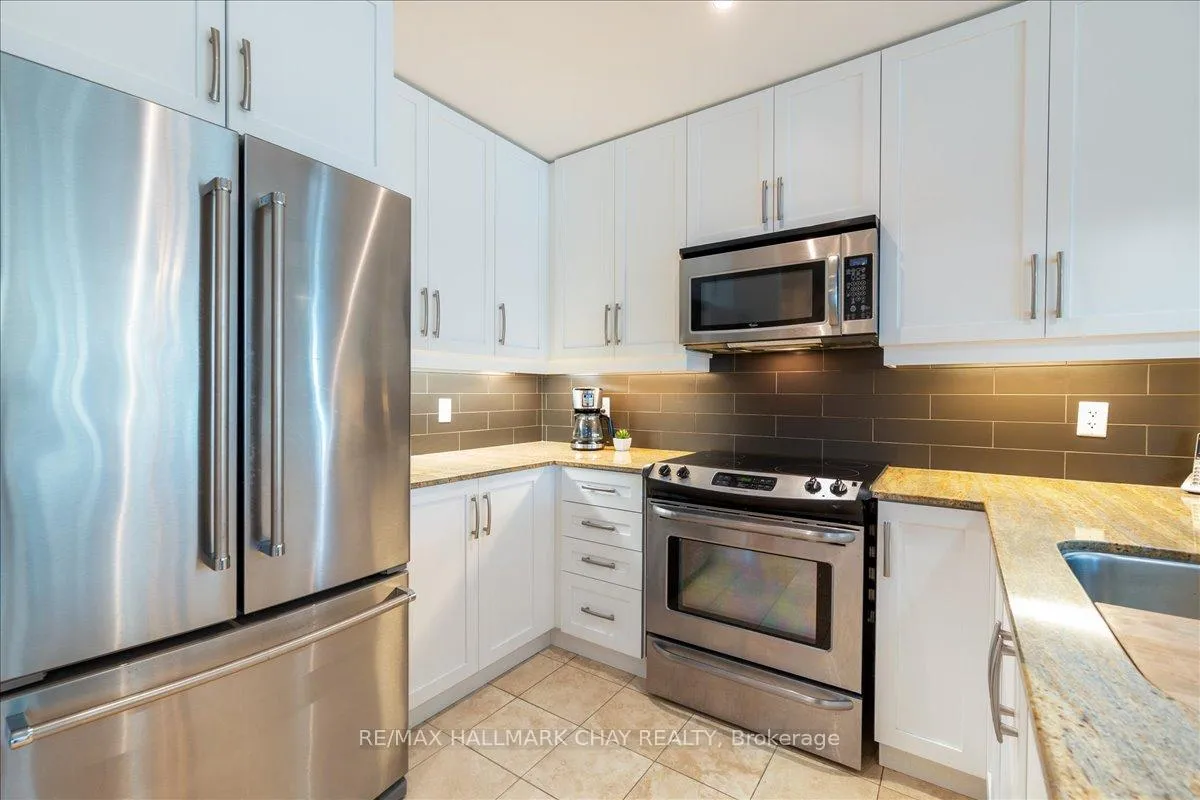 Photo 9 of Unit 1108, 33 Ellen Street, Barrie, Lakeshore — HOMEH