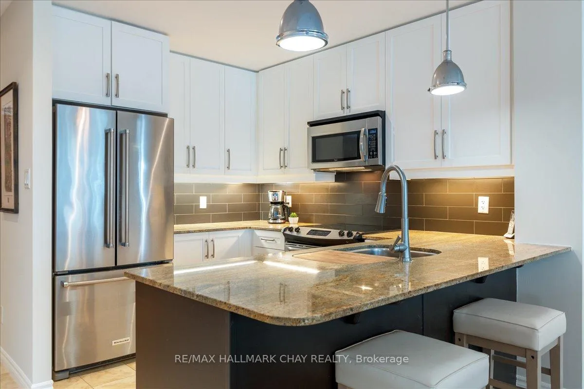 Photo 11 of Unit 1108, 33 Ellen Street, Barrie, Lakeshore — HOMEH