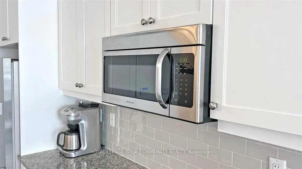 Photo 14 of Unit 702B, 15277 Yonge Street, Aurora, Aurora Village — HOMEH