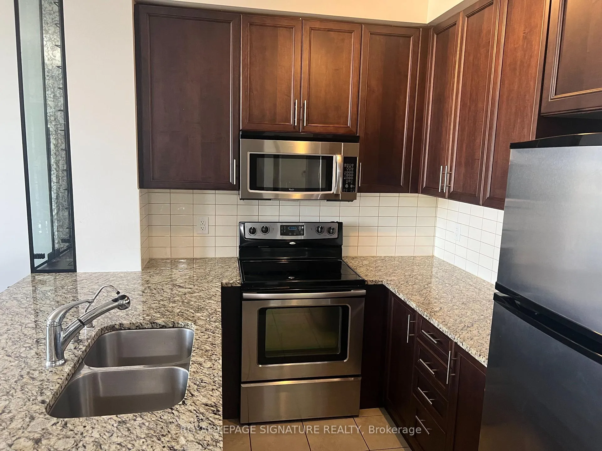 Photo 5 of Unit 701, 9245 Jane Street, Vaughan, Maple — HOMEH