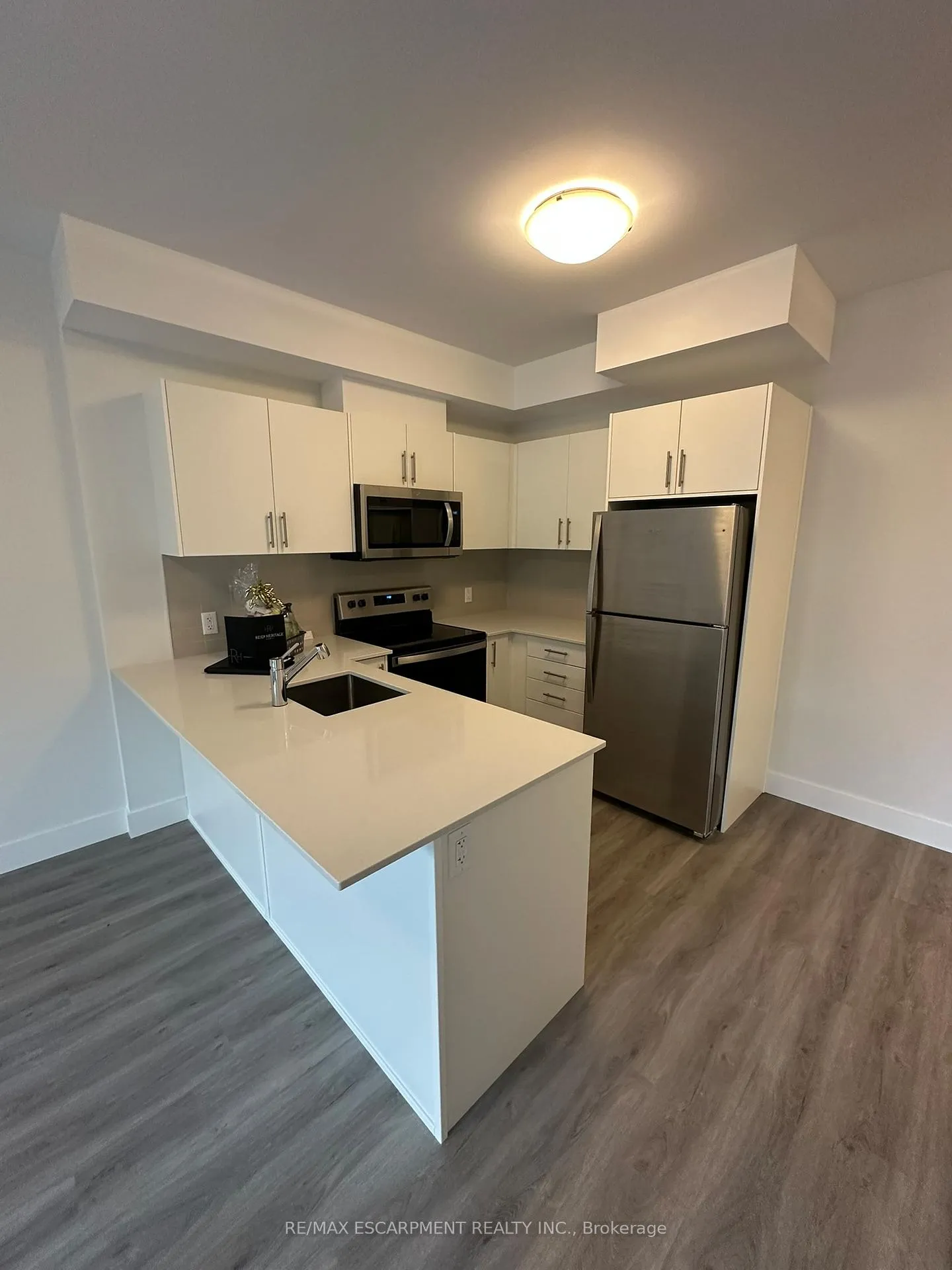 Photo 1 of Unit 307, 1000 Lackner Place, Kitchener — HOMEH