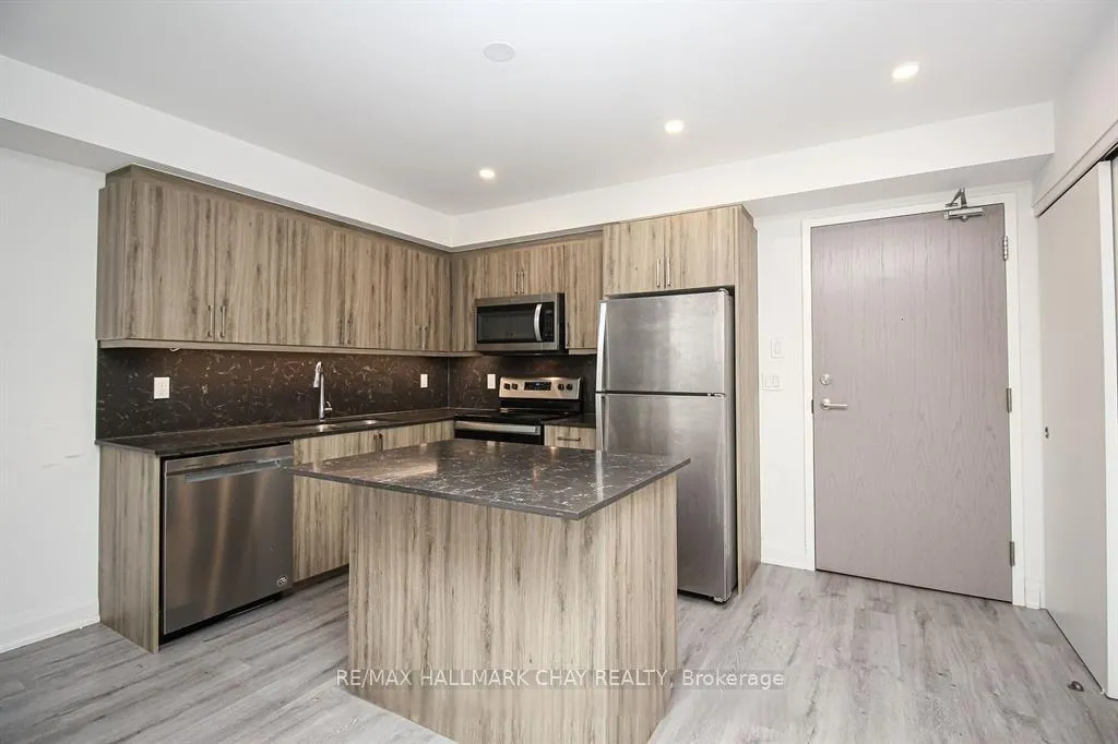 Photo 4 of Unit 308, 58 Lakeside Terrace, Barrie, Little Lake — HOMEH
