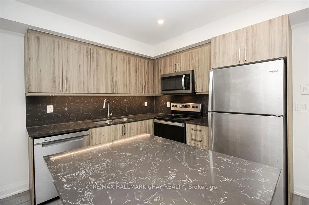 Photo 5 of Unit 308, 58 Lakeside Terrace, Barrie, Little Lake — HOMEH