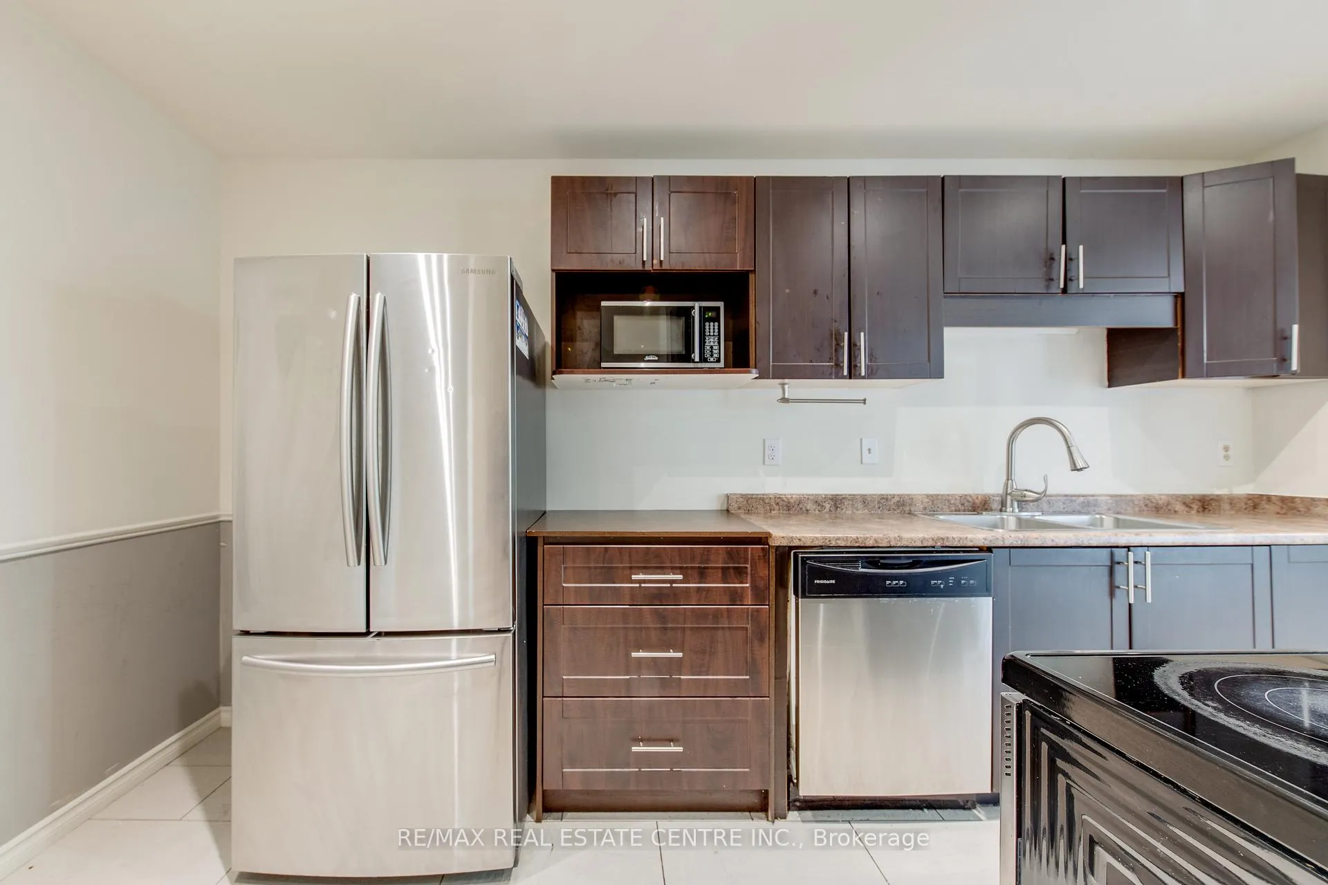 Photo 11 of Unit 15, 700 Harmony Road N, Oshawa, Pinecrest — HOMEH