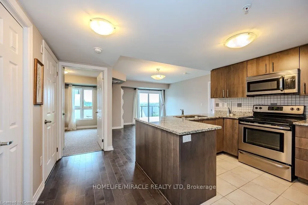 Photo 6 of Unit 413, 50 Bryan Court, Kitchener, Grand River South — HOMEH