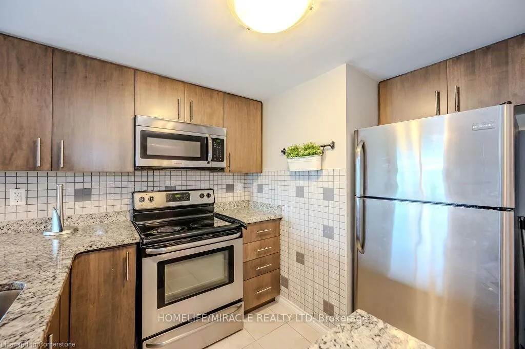 Photo 8 of Unit 413, 50 Bryan Court, Kitchener, Grand River South — HOMEH